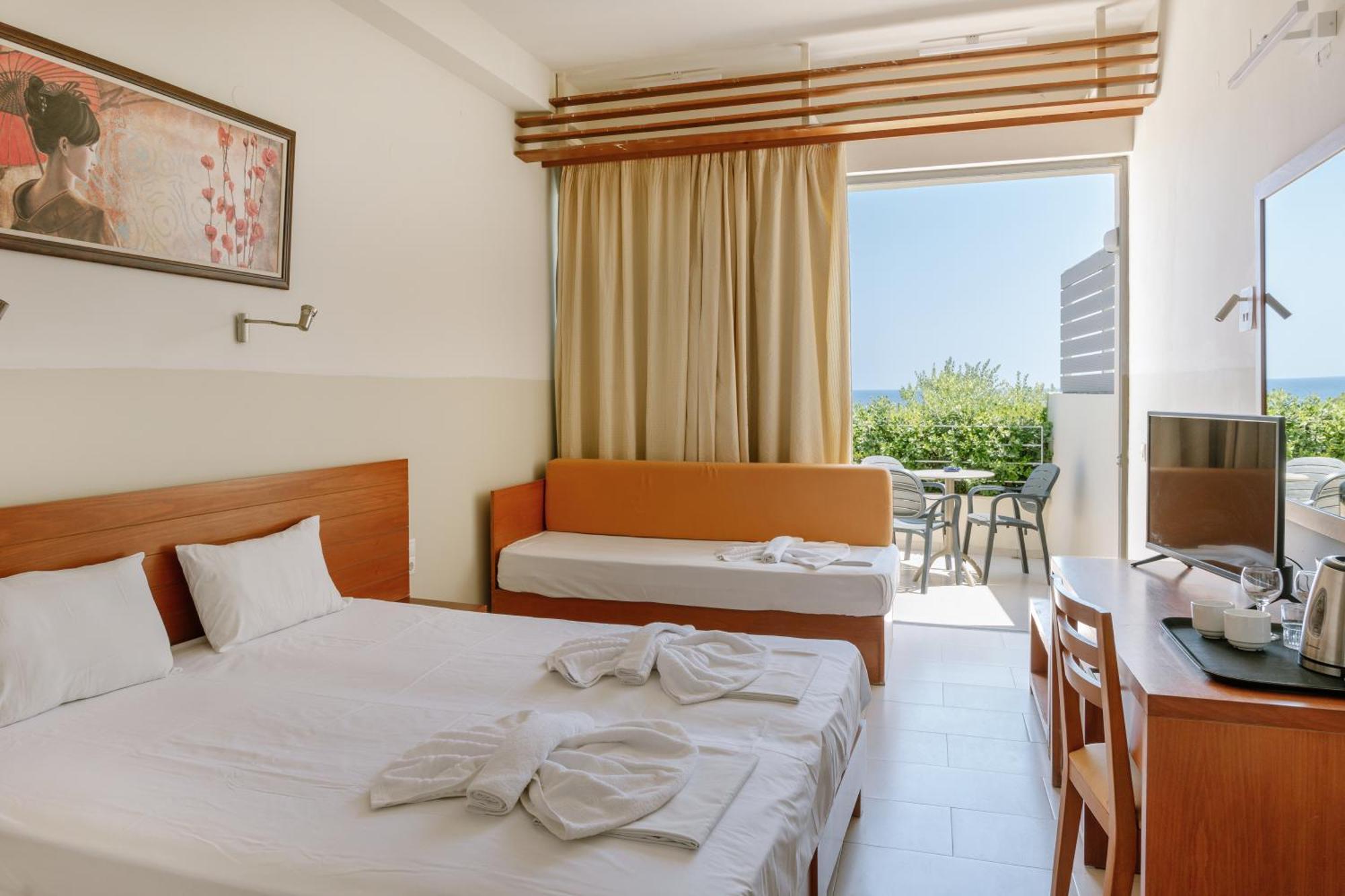 Double or Twin Room Partial Sea View,1552825465:JPEG