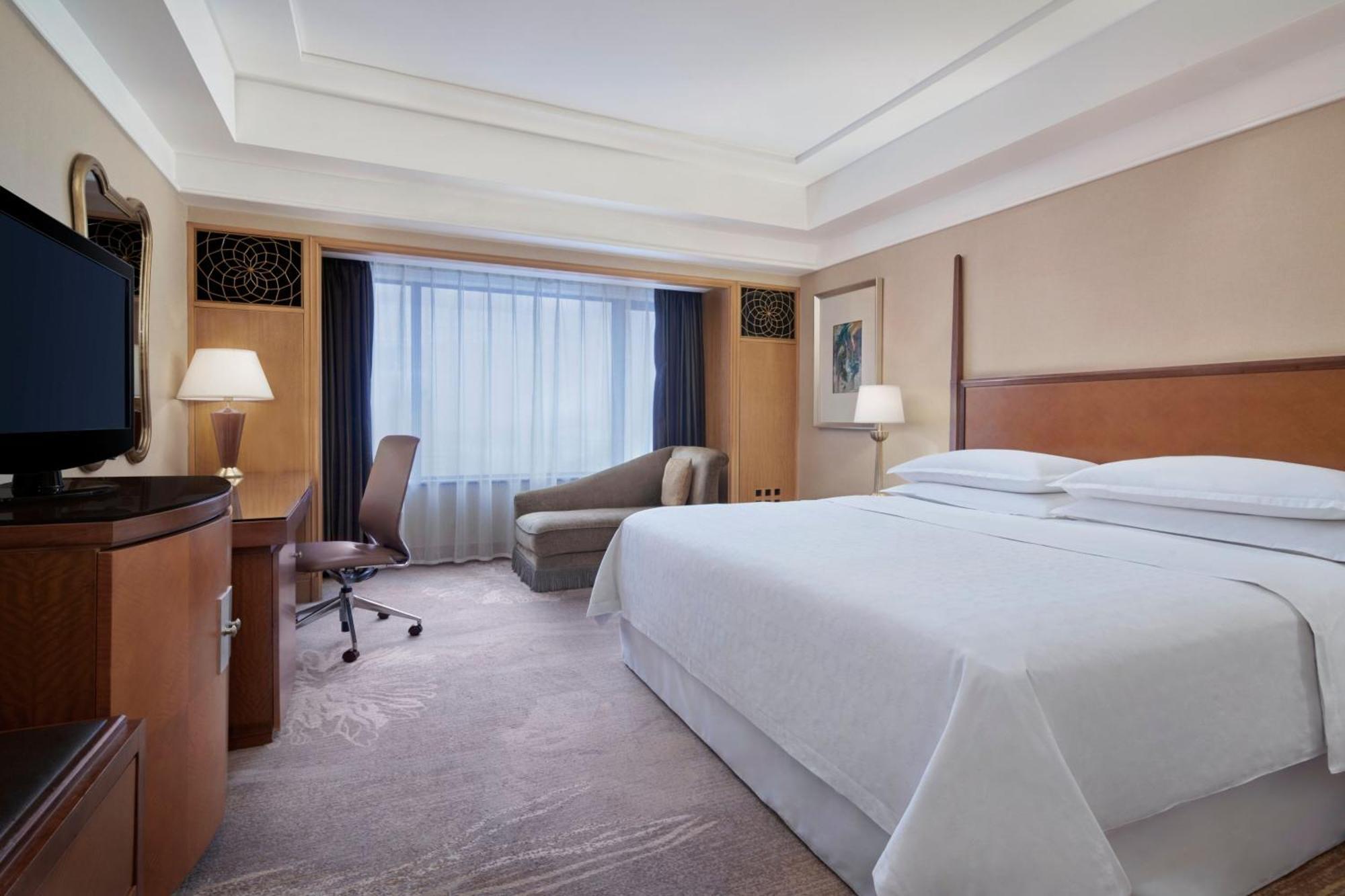 Habitación Doble Deluxe con cama extragrande y vistas a la ciudad