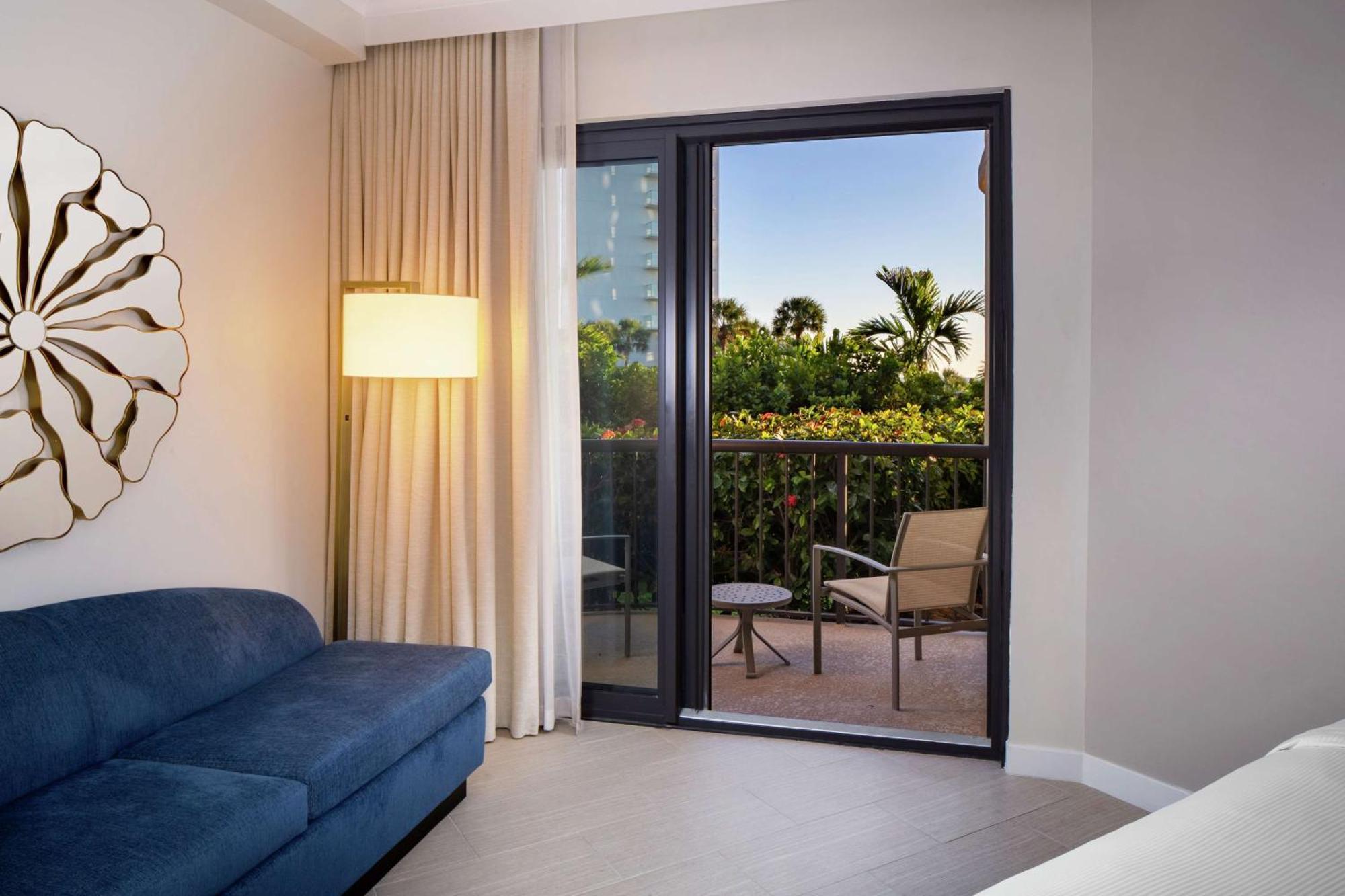 Zimmer Lanai mit 1 Kingsize-Bett zur Poolseite