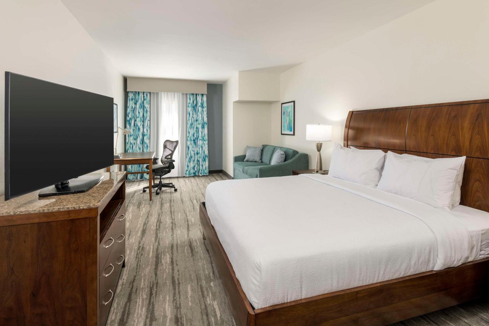 Habitación con cama extragrande y bañera accesible - Adaptada para personas con movilidad reducida
