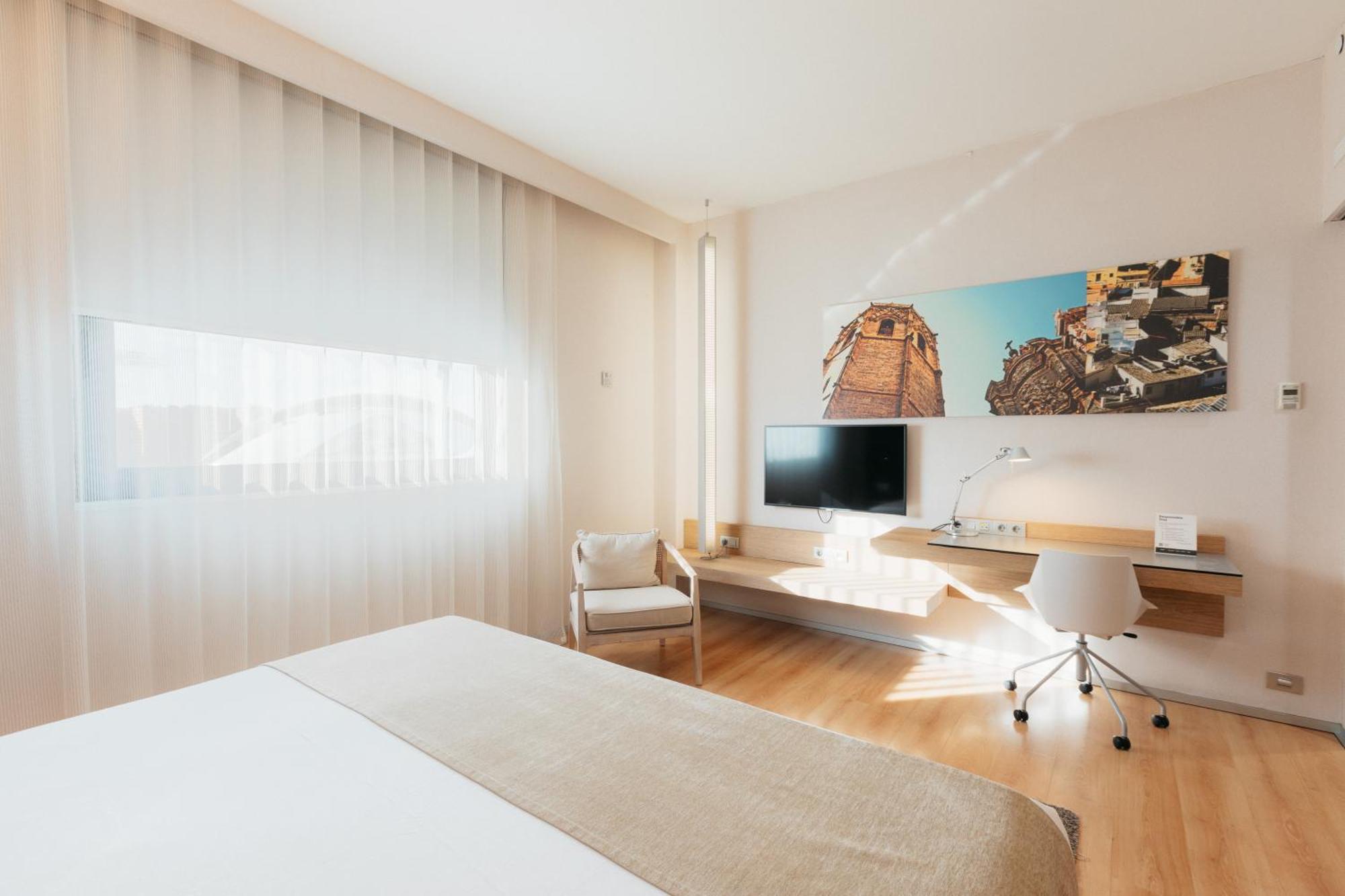 Quarto Deluxe com Cama de Casal ou 2 de Solteiro e Vistas