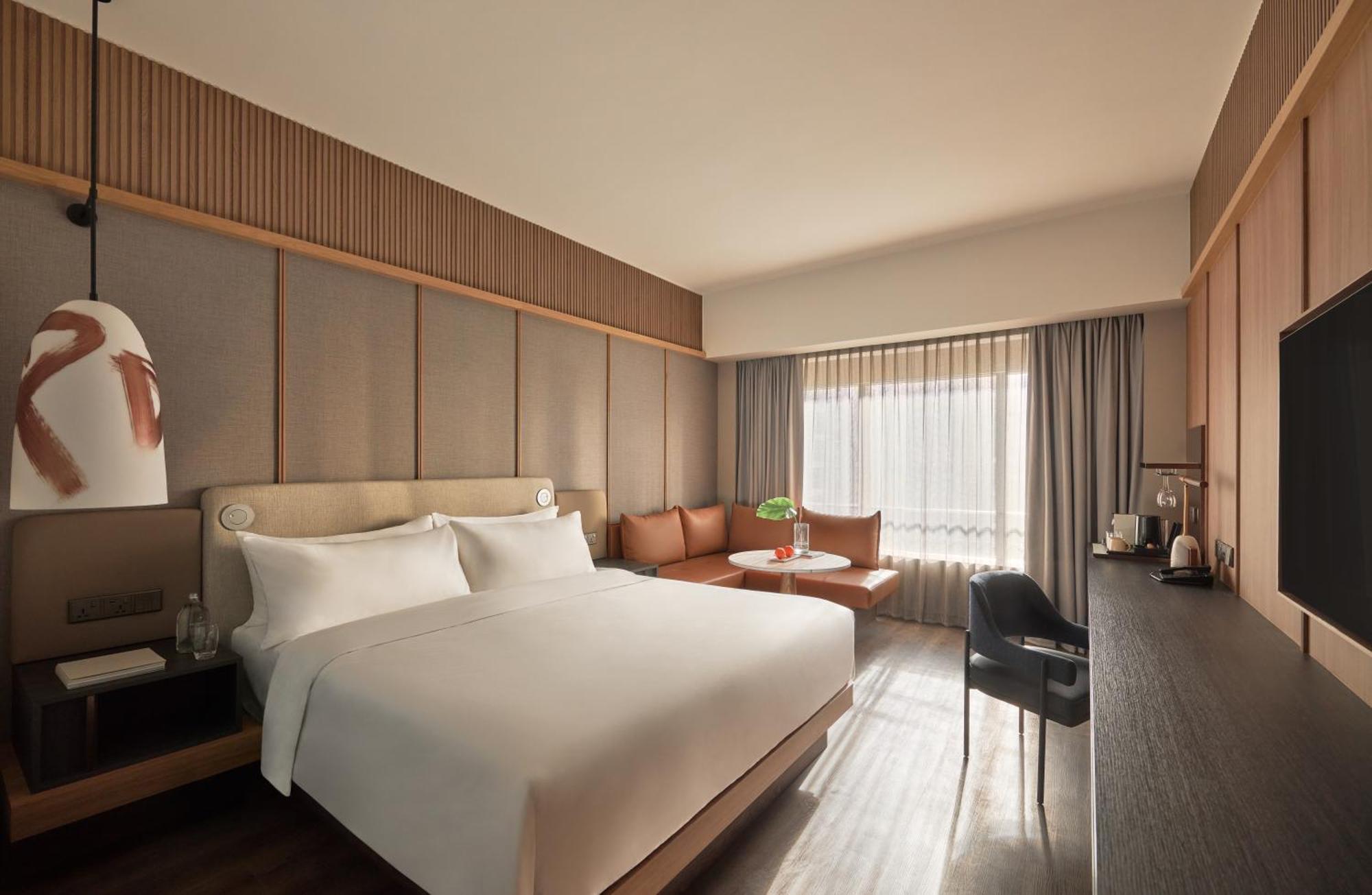 Habitación Club con cama extragrande, acceso al club Lounge y 2 camas - Planta superior