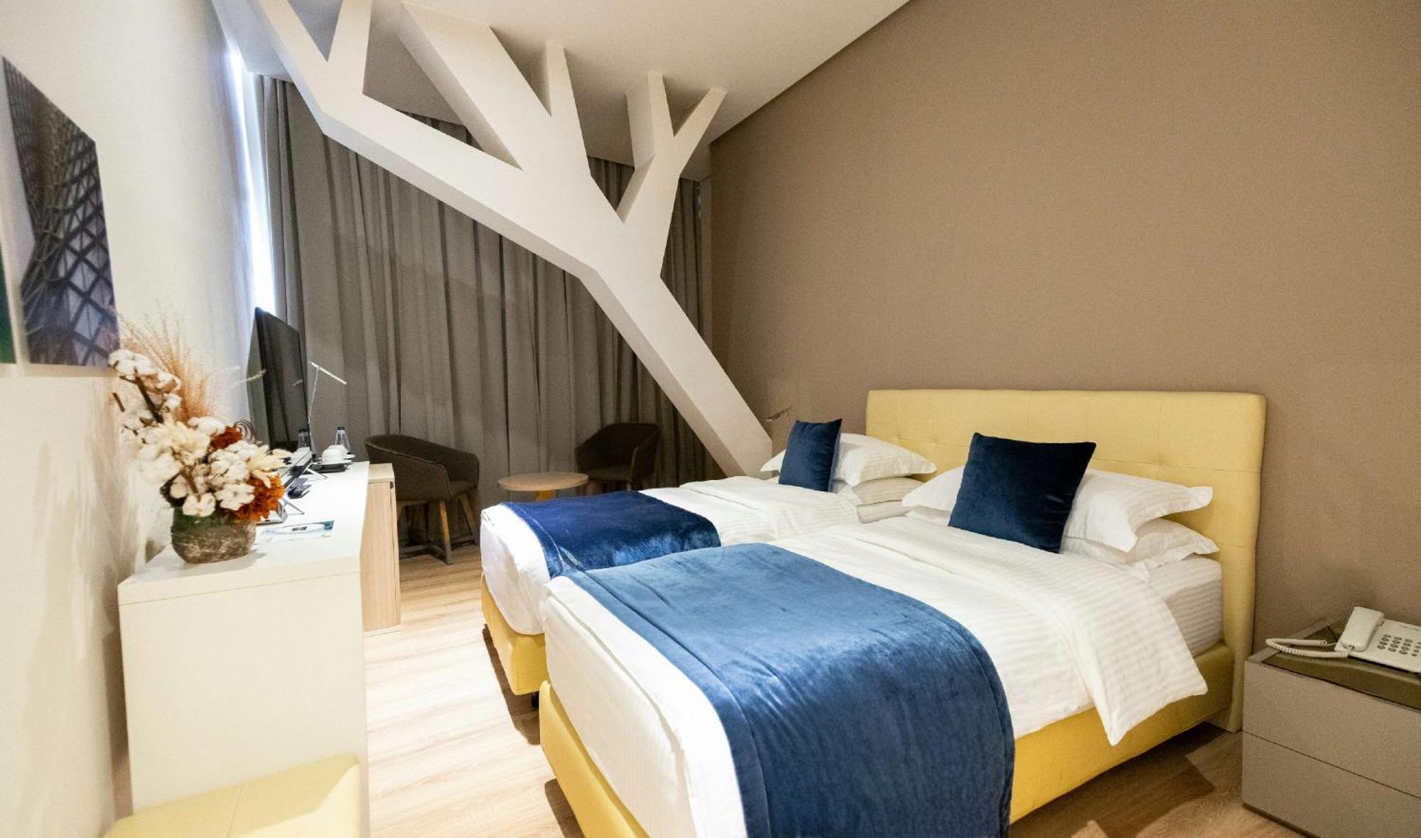 Quarto Comfort com 2 Camas de Solteiro
