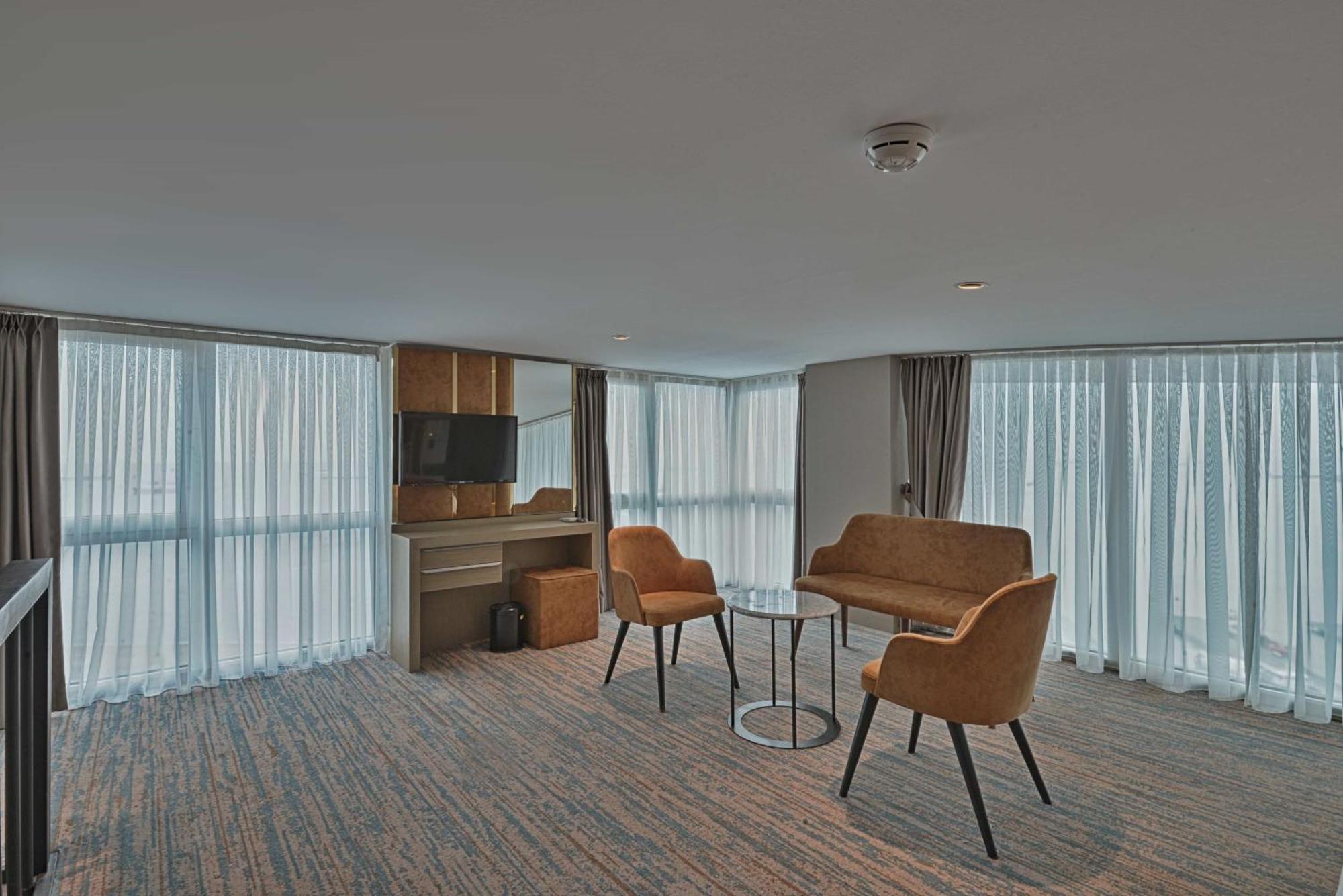 Duplex Suite One Queen Bed Two Single Beds Balcony View