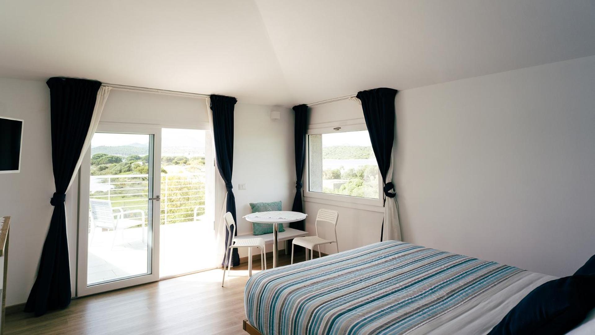Kamer met Queensize Bed en Uitzicht op Zee
