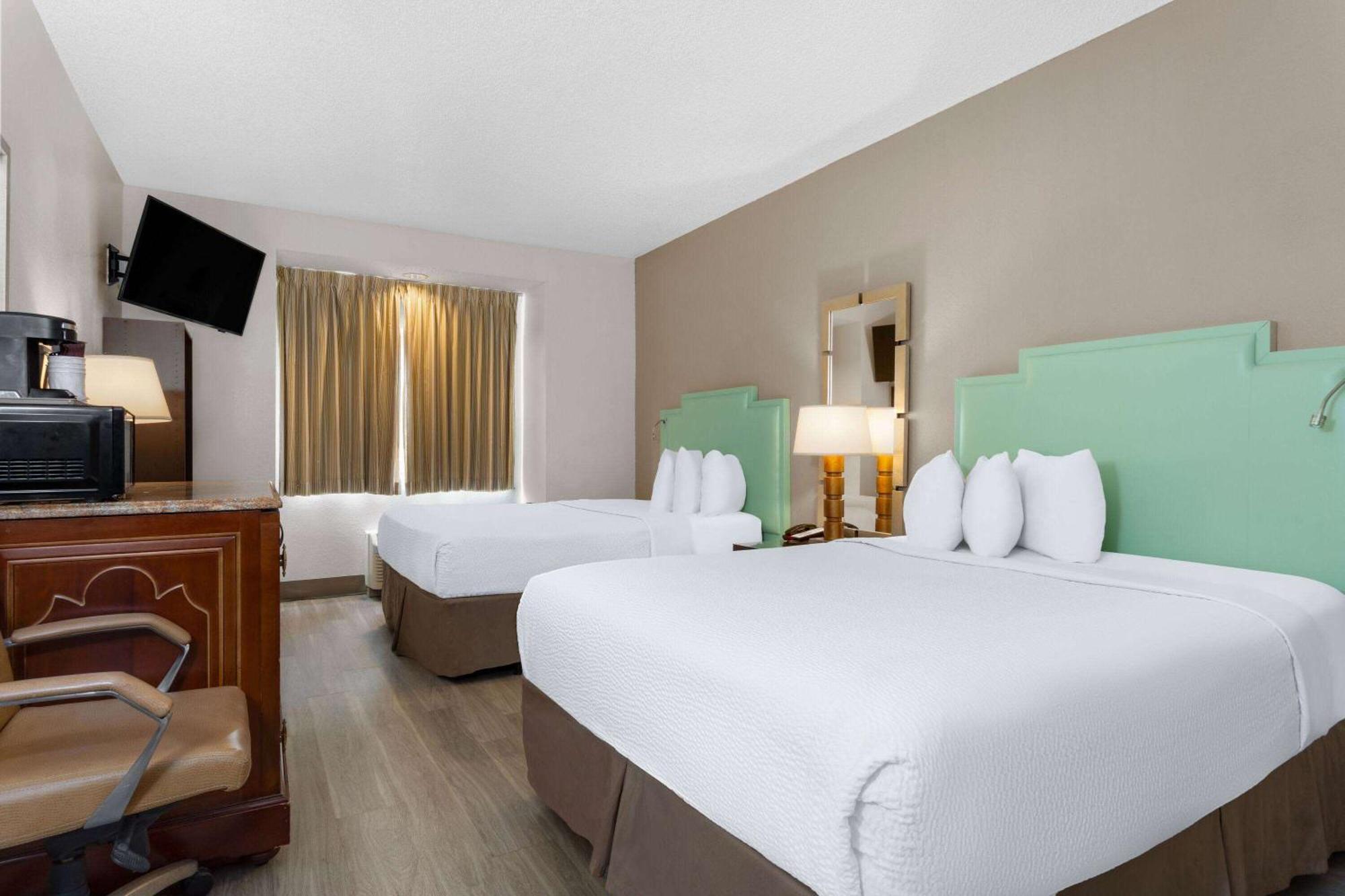 Room Two Queen Beds Mobility or Hearing Access Roll Shower Non-Smoking