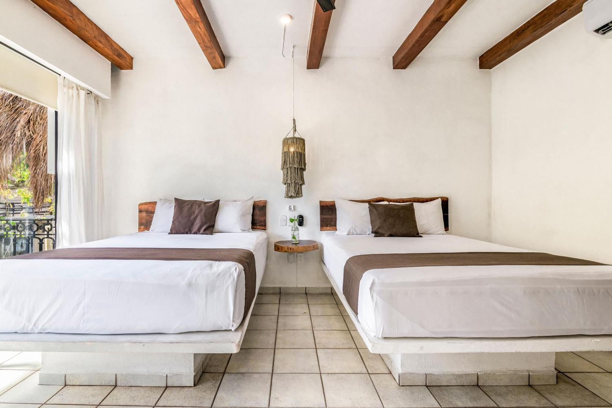 Chambre Deluxe Double ou Lits Jumeaux