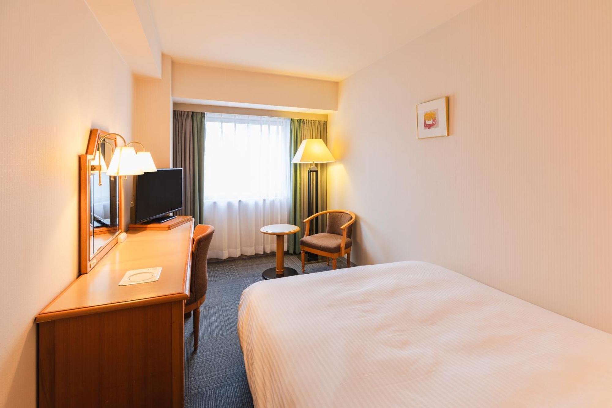 Chambre Double avec Petit Lit Double - Fumeurs