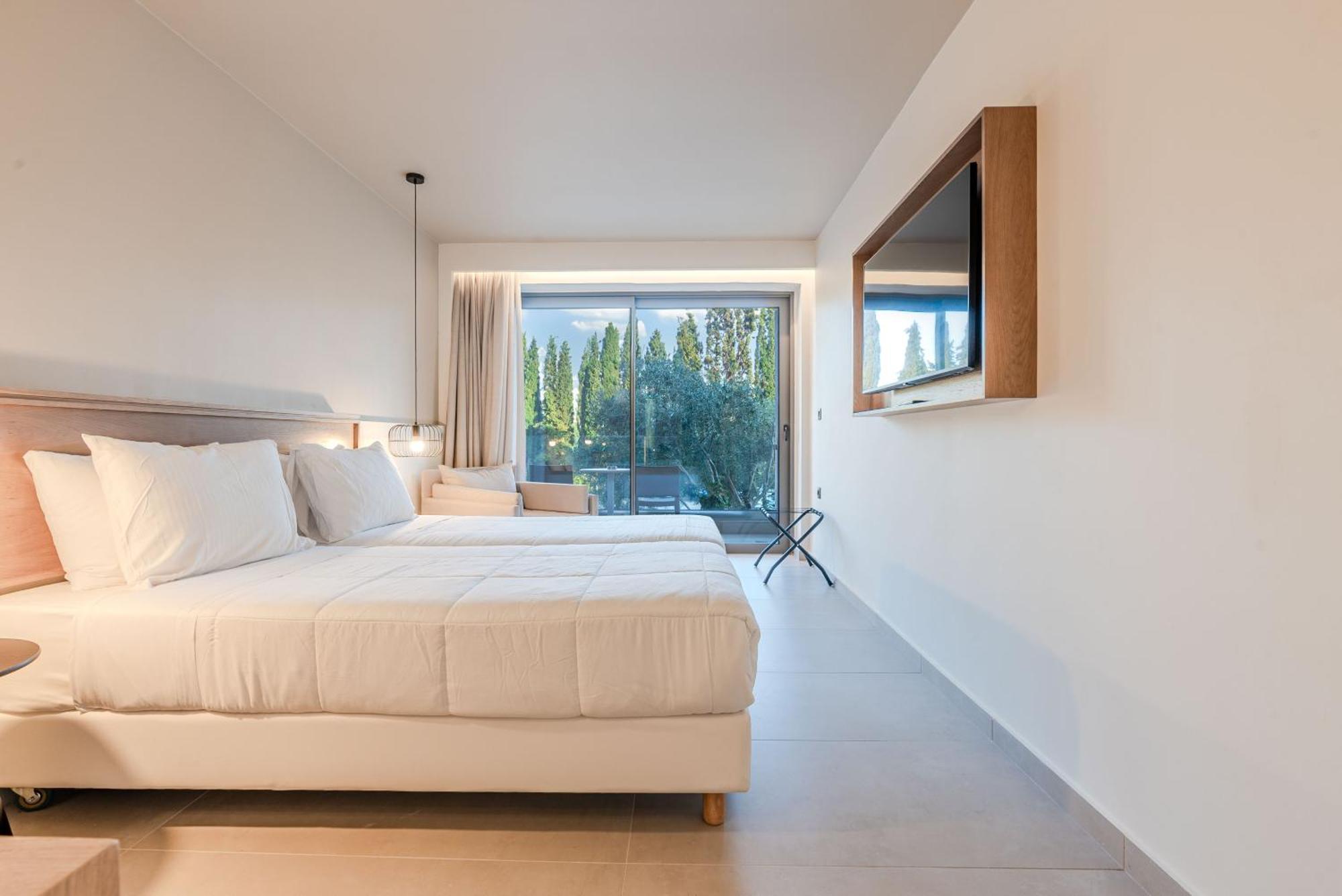 Chambre Triple Premium - Vue sur Jardin