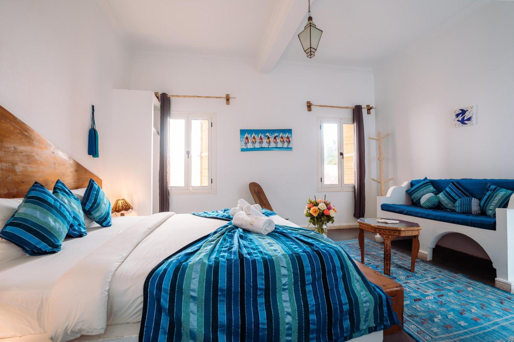 Chambre Double Deluxe (2 Adultes + 1 Enfant)