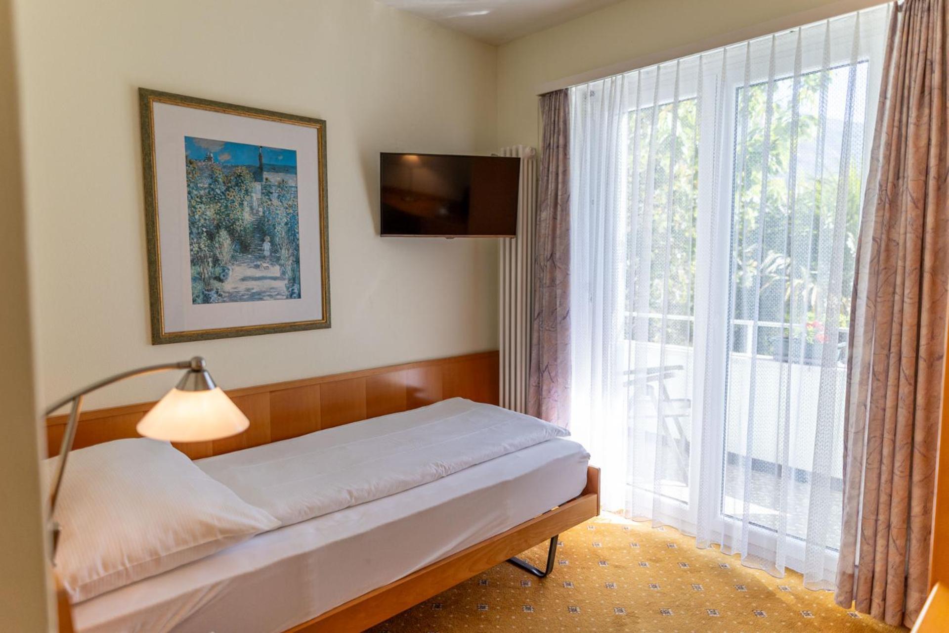Quarto Individual com Varanda