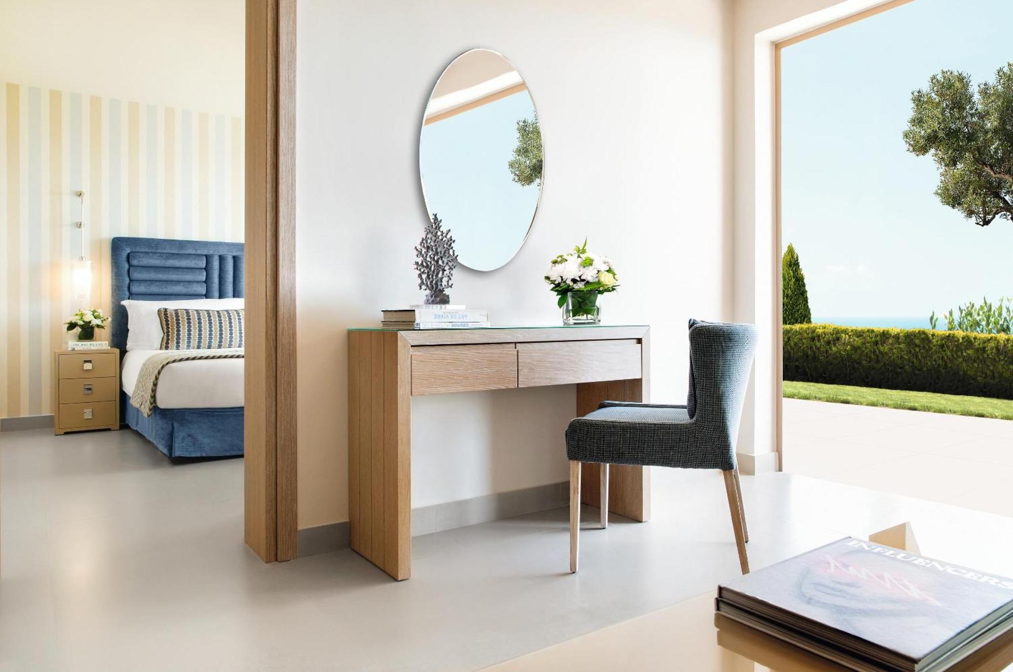 Diese Familiensuite mit einem Schlafzimmer bietet einen eigenen Garten und Meerblick
