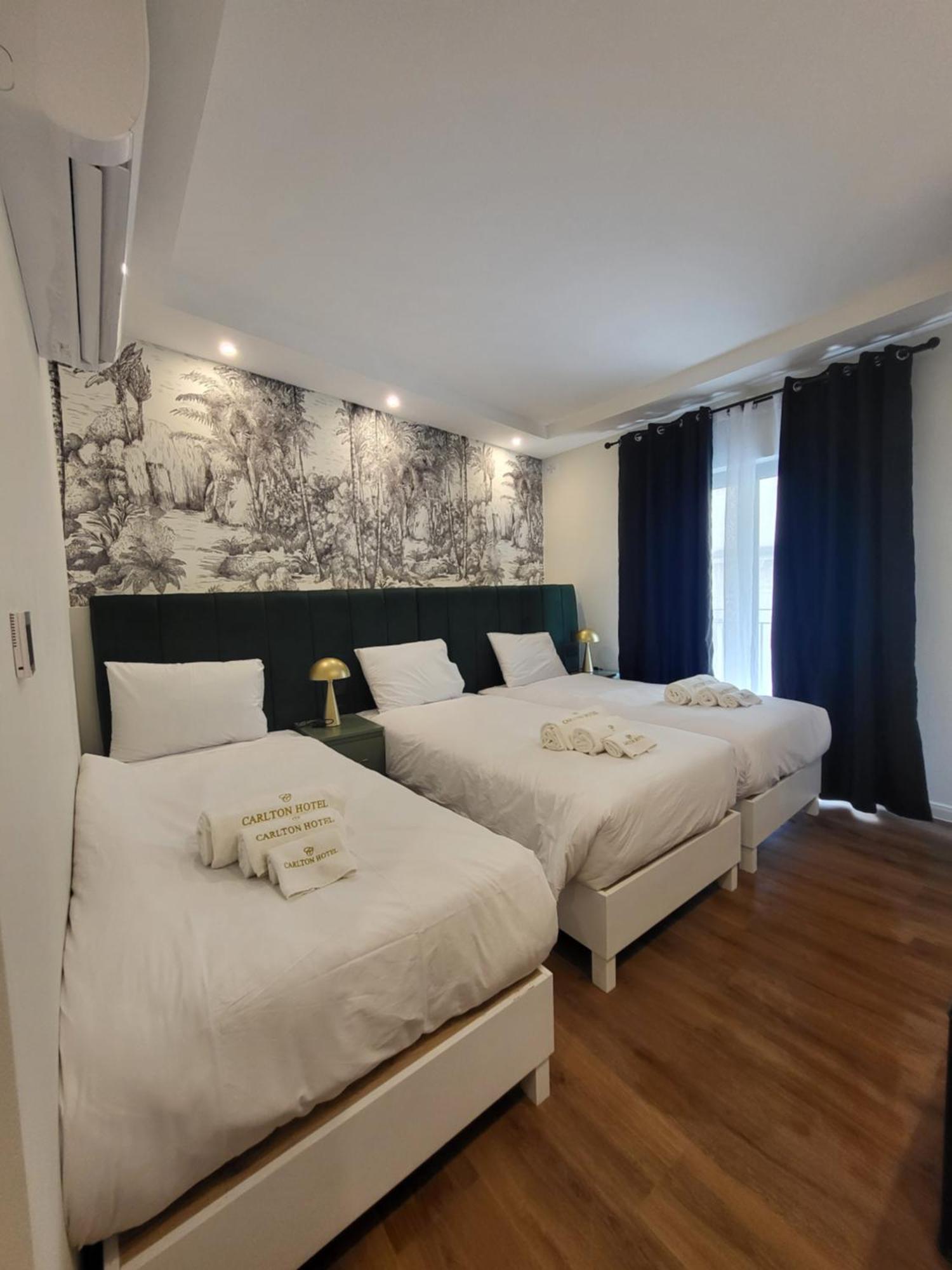 Dreibettzimmer mit Meerblick