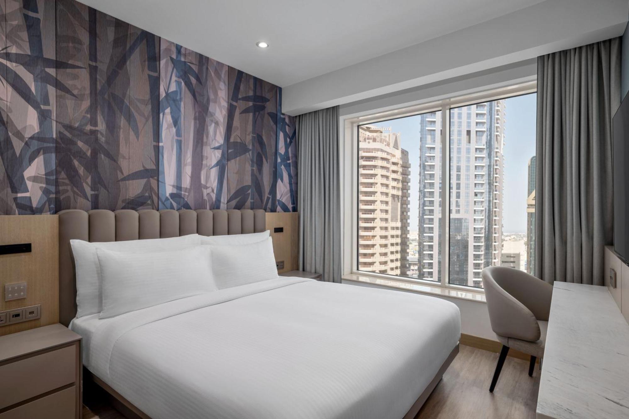 Premium One Bedroom Suite 1 Queen Bed City View Includes Food & Beverage