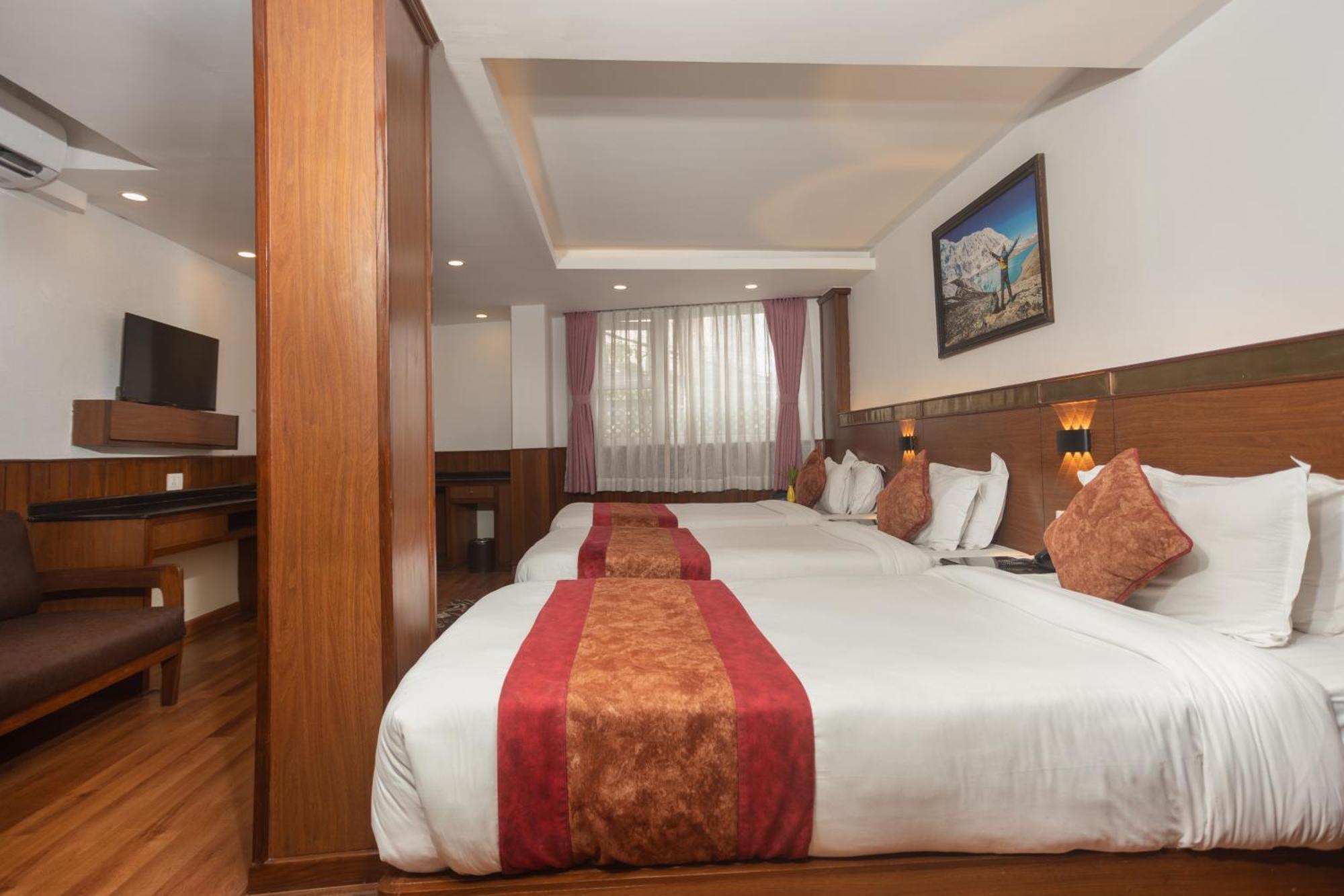 Deluxe Triple Room Airport Pickup