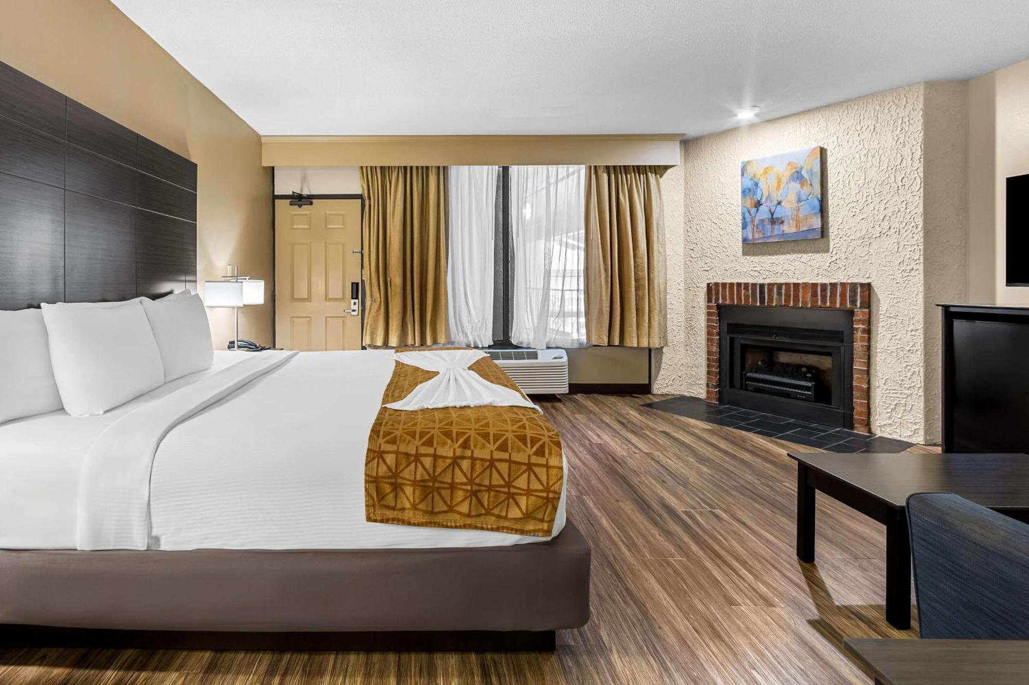 Quarto King com Sofá-cama e Cabina de Duche