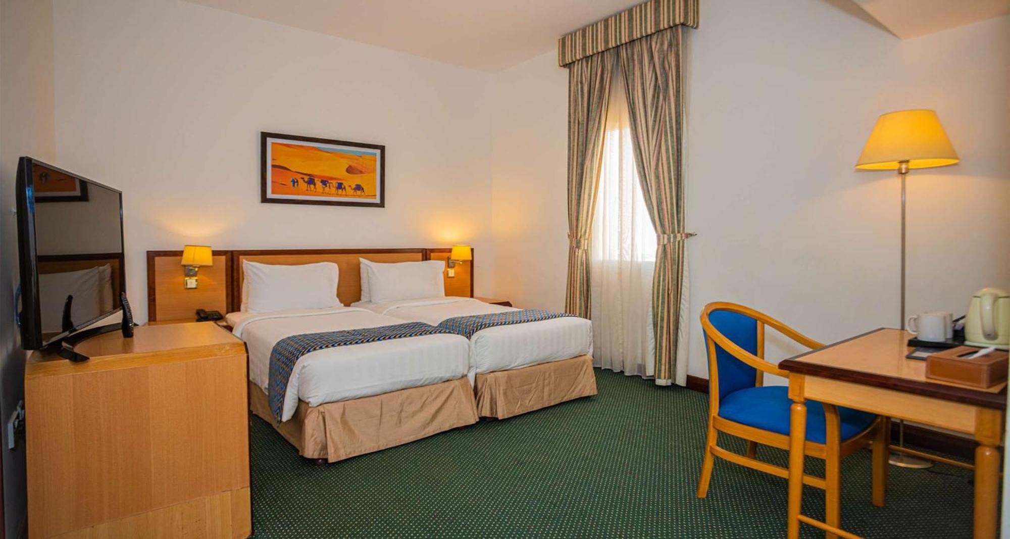 Familiesuite met 1 Kingsize Bed en 2 Eenpersoonsbedden - Rookvrij