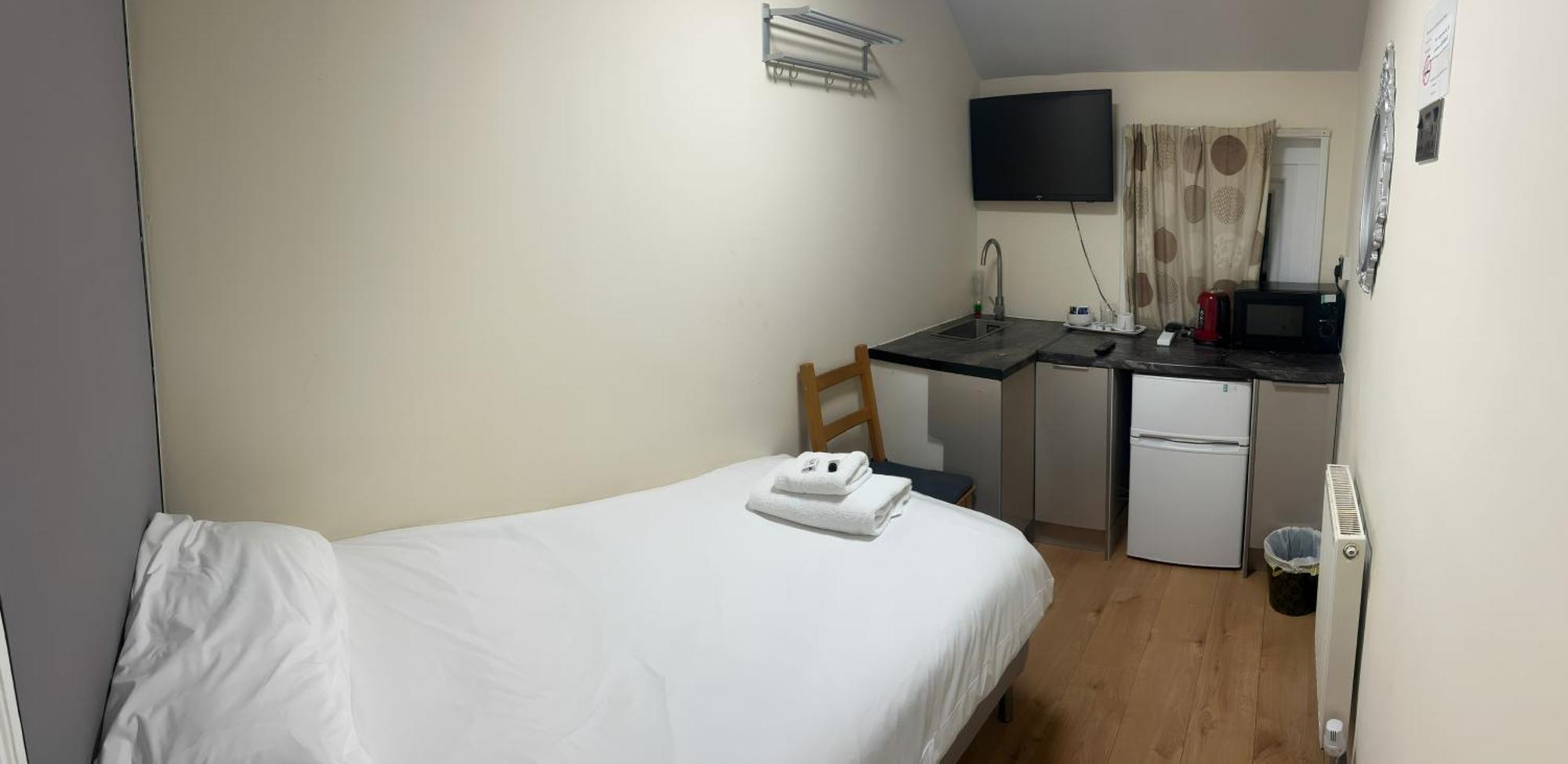 Camera Singola con Bagno in Comune