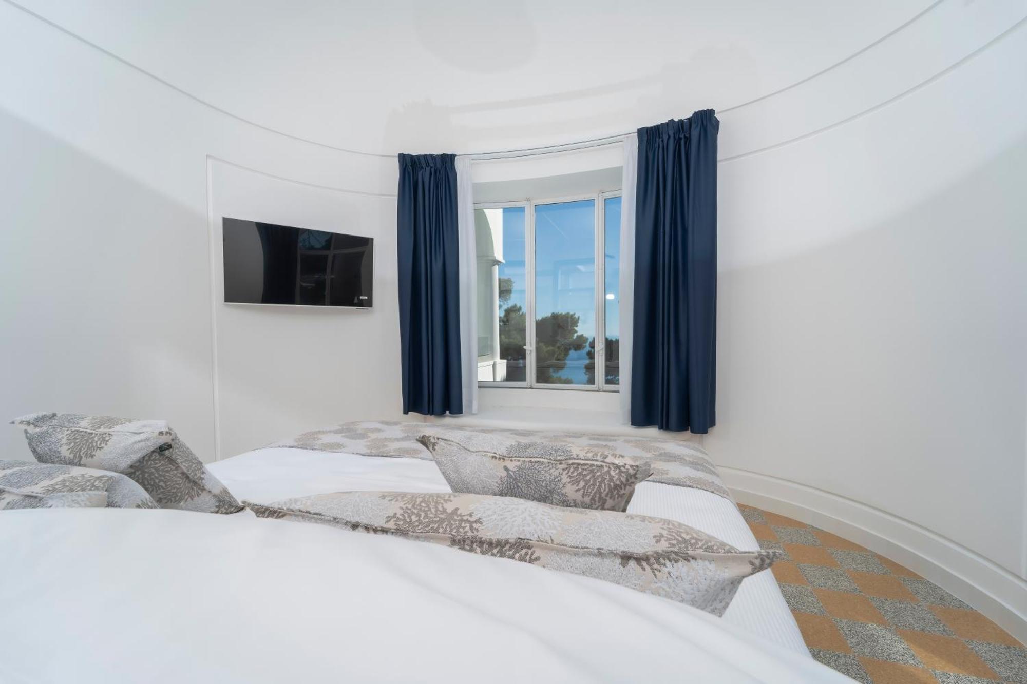 Habitación Doble Deluxe con balcón y vistas al mar