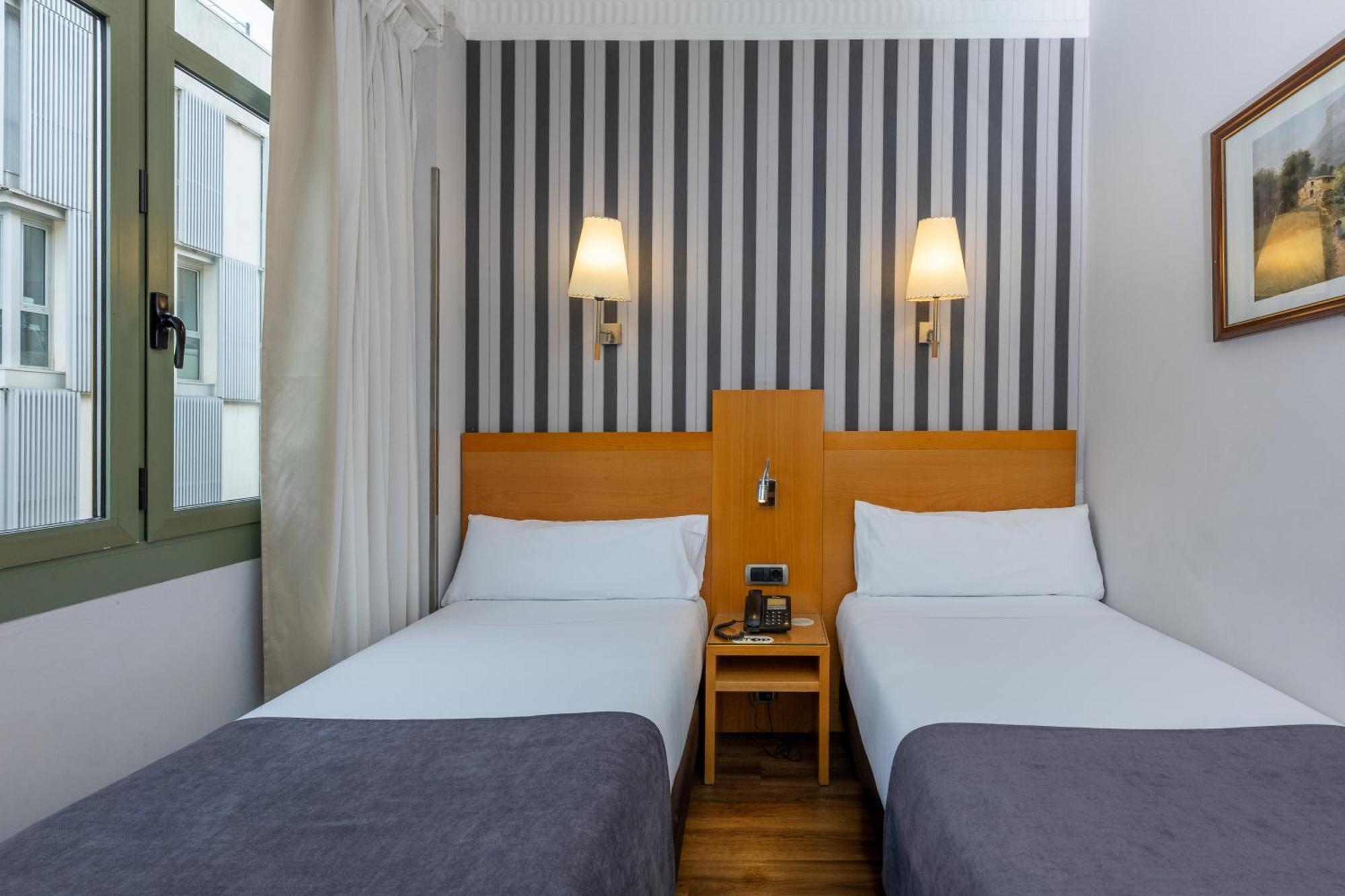Doppel- oder Zweibettzimmer