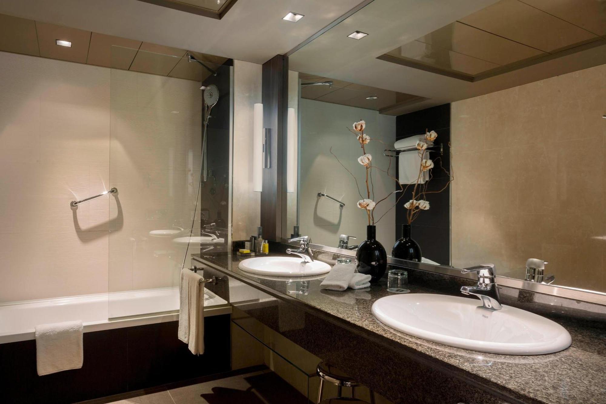 Executive Suite mit 2 Einzelbetten und Zugang zur Lounge