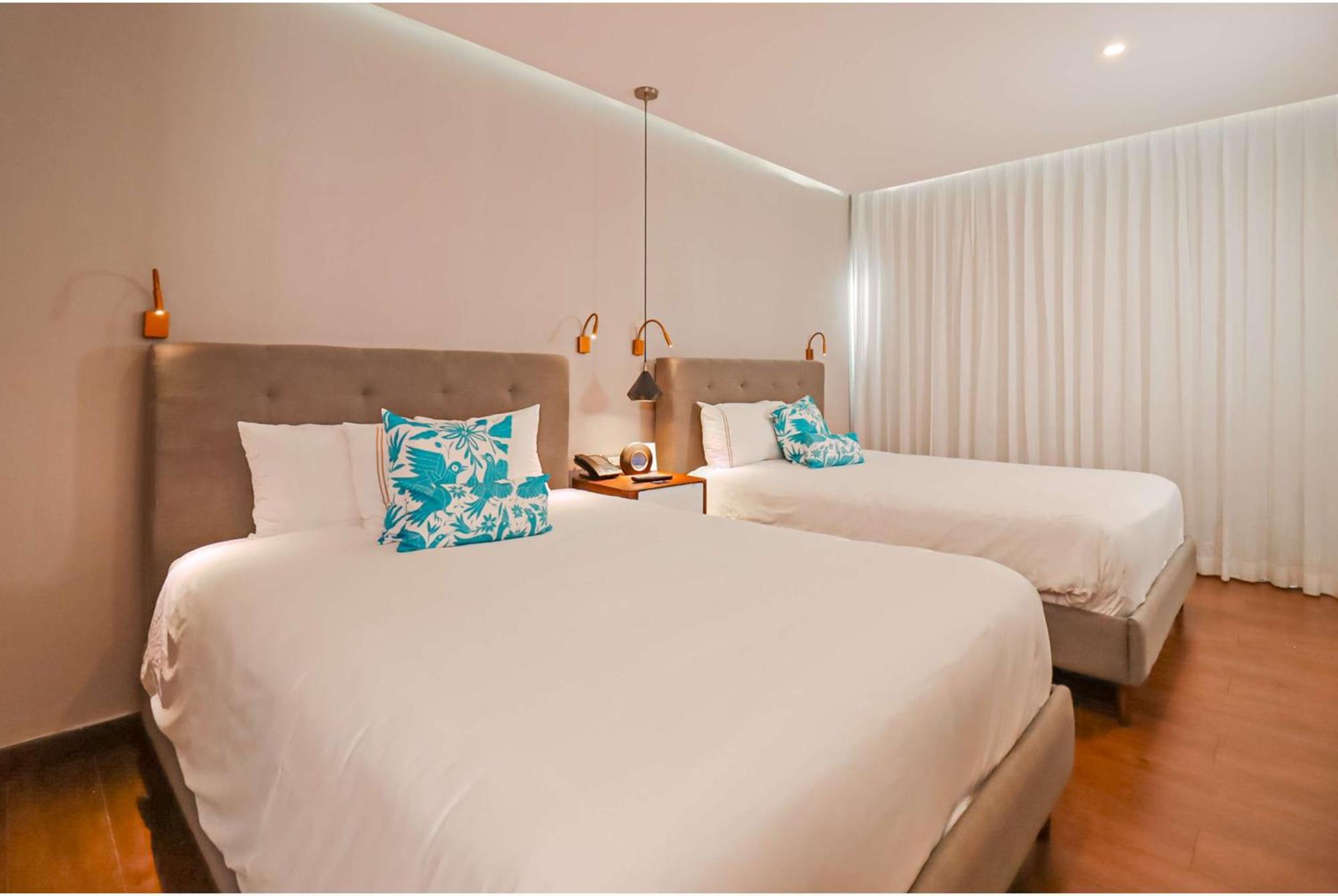 Deluxe Room Tow Double Beds Courtyard View