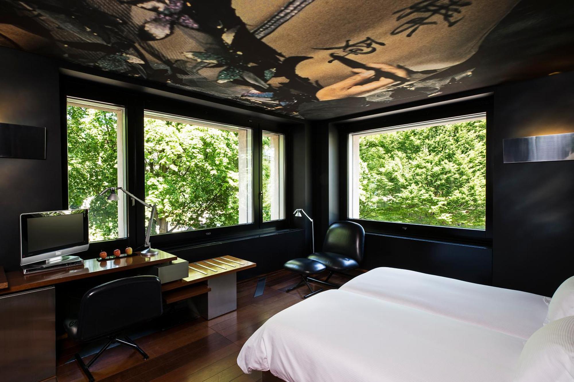 Suite Junior d'Angle avec 1 Lit King-Size - Vue sur Parc