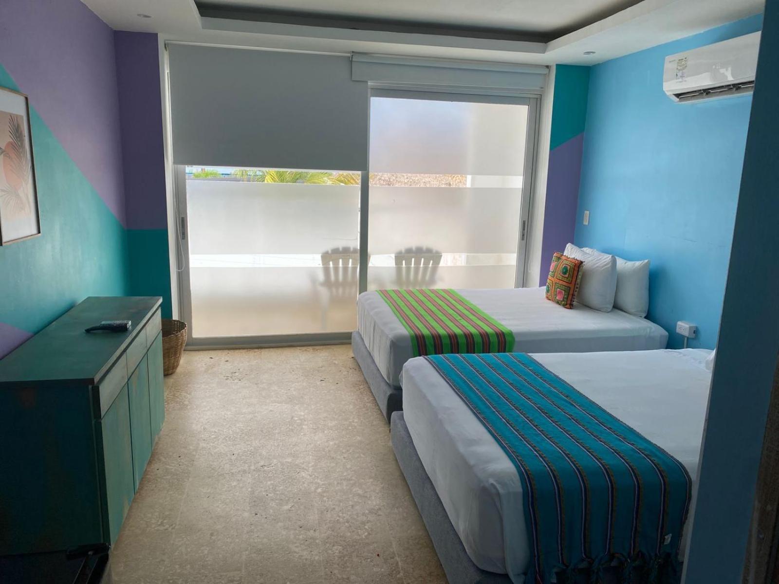 Deluxe Tweepersoonskamer met 2 Aparte Bedden en Uitzicht op Zee
