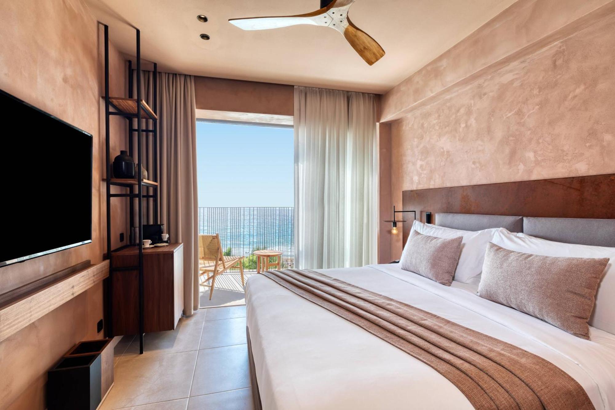 Sapphire Retreat Kamer met 1 Kingsize Bed en Balkon - Uitzicht op Zee