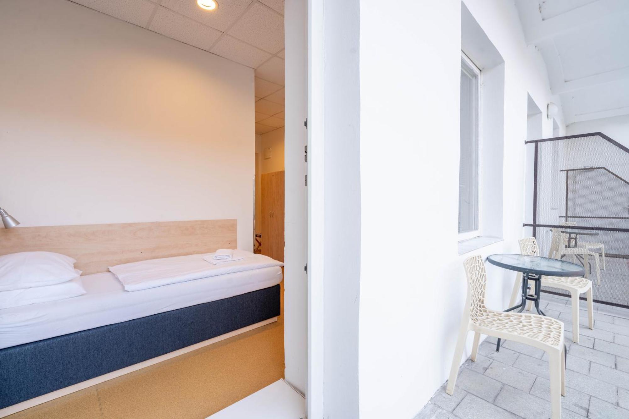 Zweibettzimmer mit Balkon