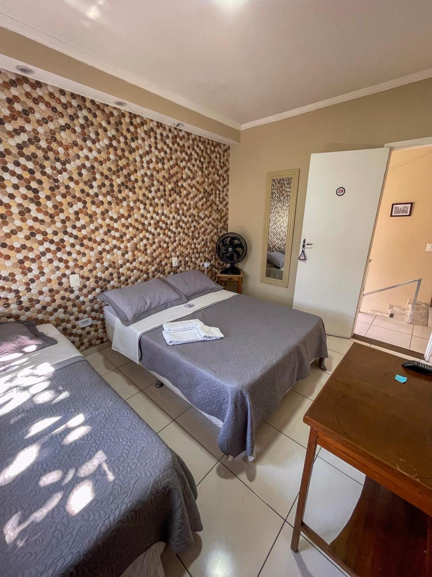 Quarto Triplo com Casa de Banho Partilhada