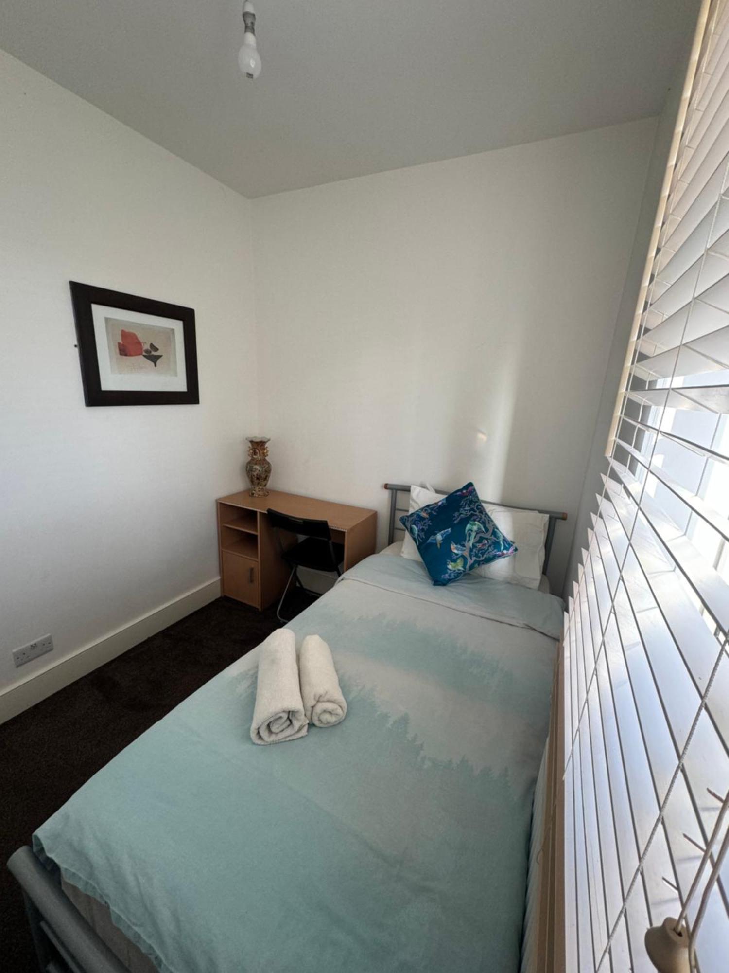Single Room Shared Shower Toilet