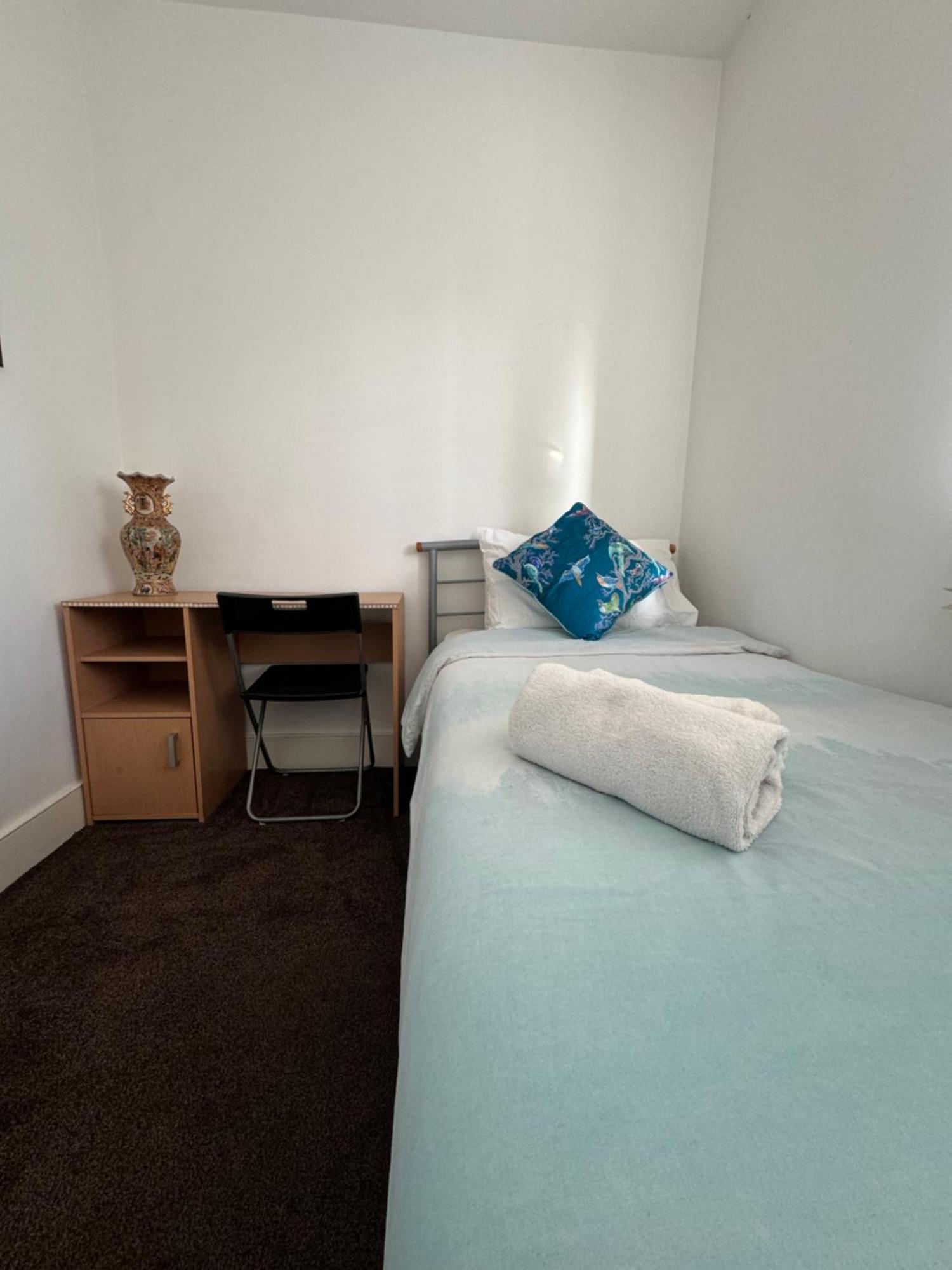 Single Room Shared Shower Toilet