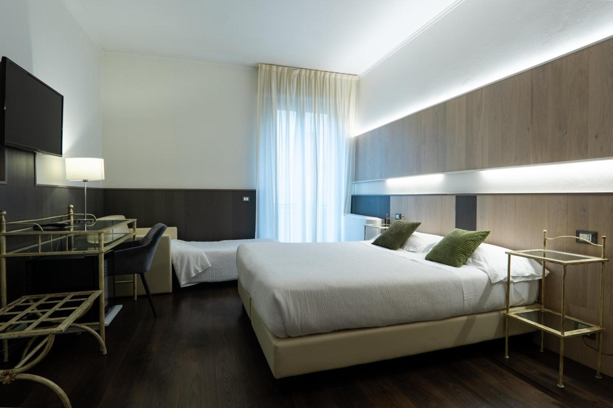 Tweepersoonskamer met 1 of 2 Bedden en een Extra Bed