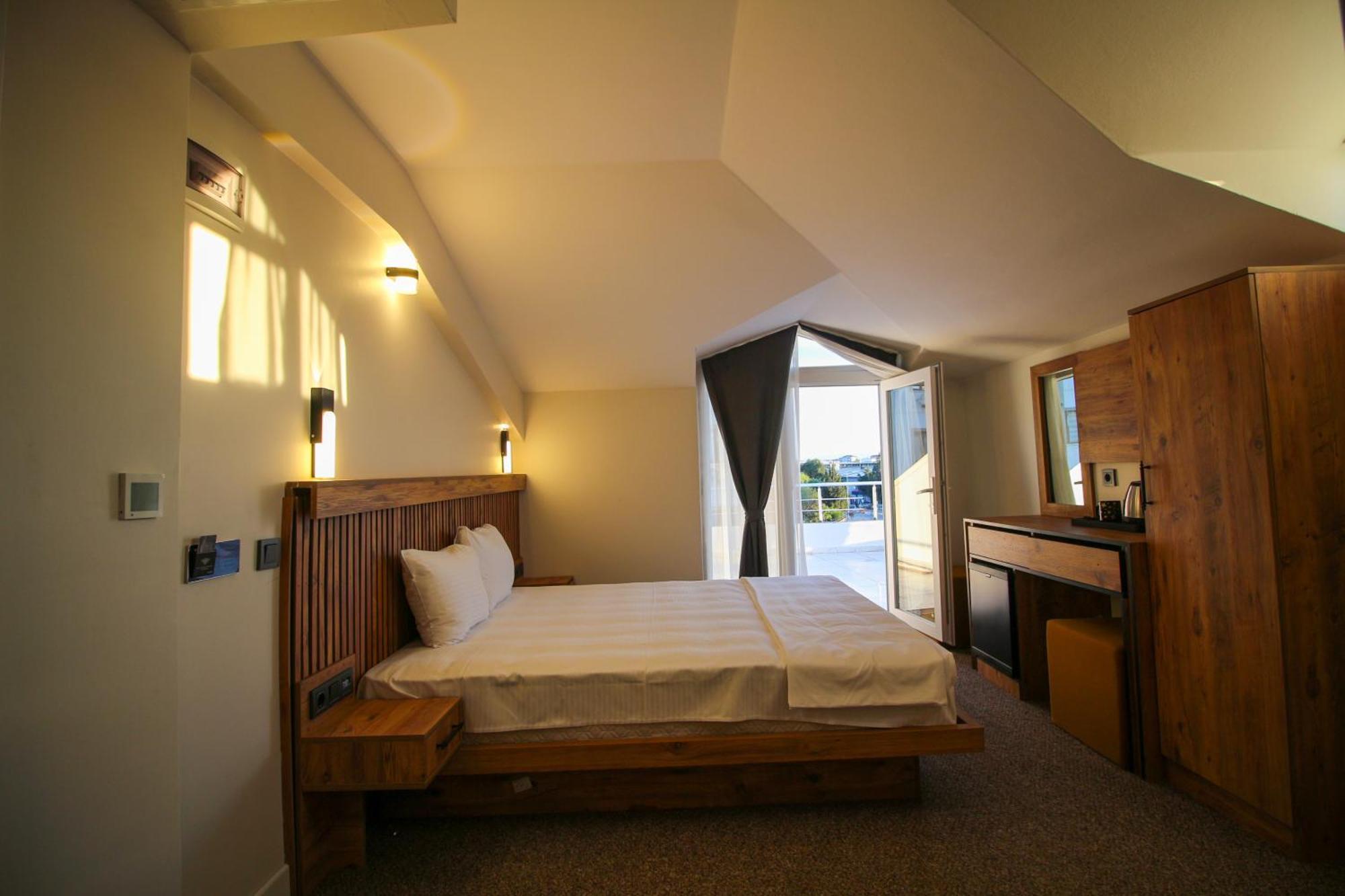 Chambre Lit King-Size avec Baignoire Spa