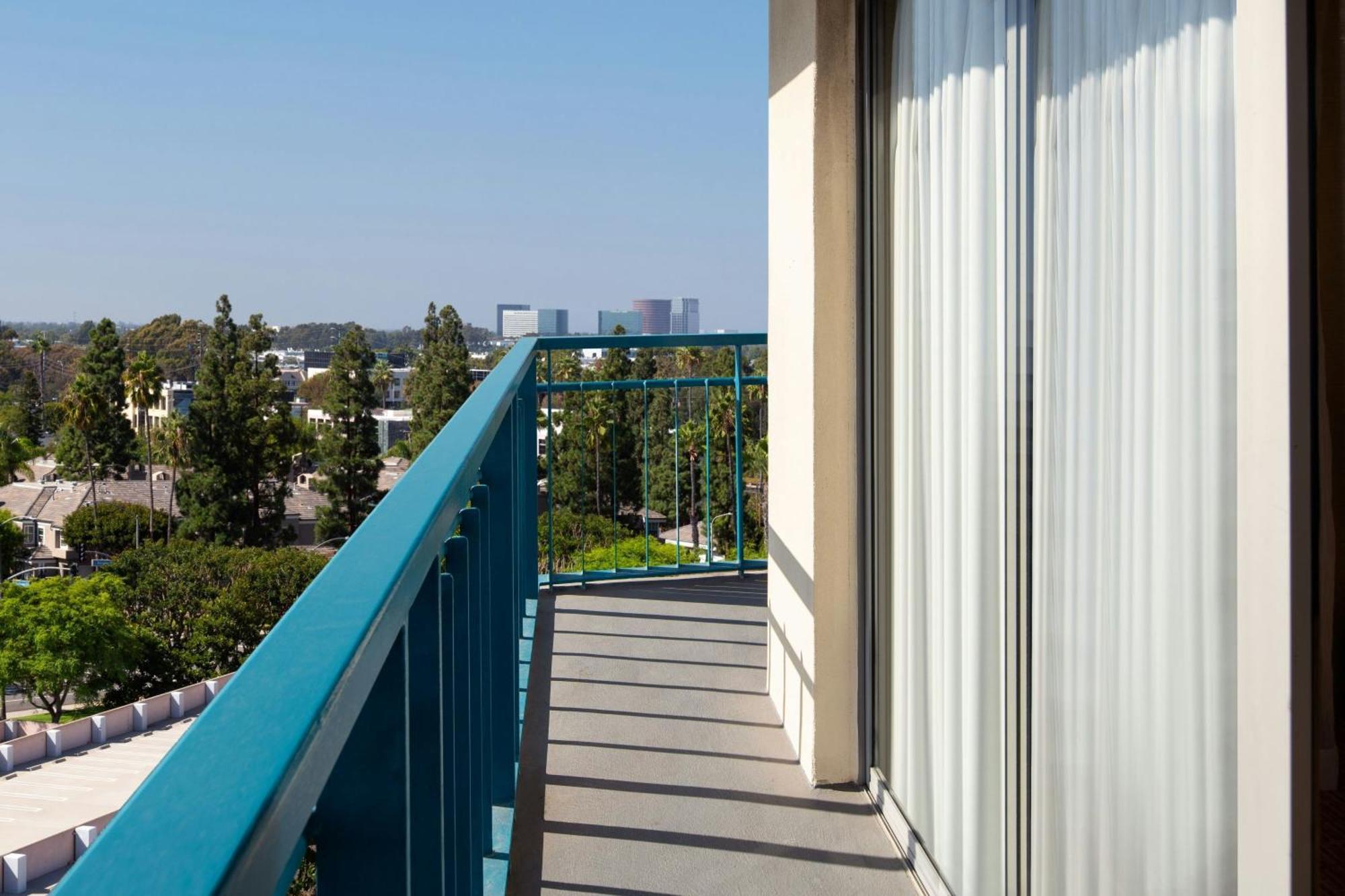 One-Bedroom King Suite Sofa Bed Balcony
