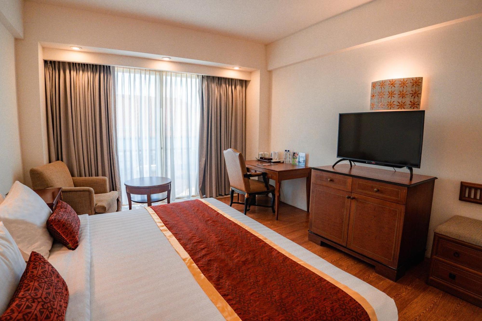 Deluxe Double or Twin Room Airport Transfer