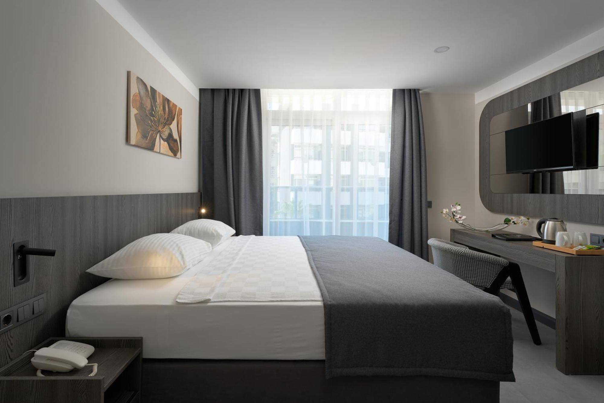 Deluxe Tweepersoonskamer met 1 of 2 Bedden