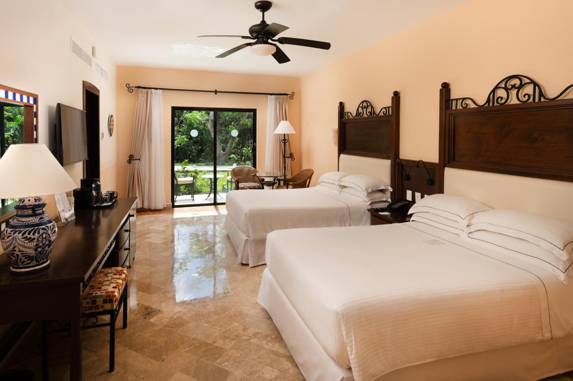 Quarto Triplo (3 Adultos + 1 Criança)