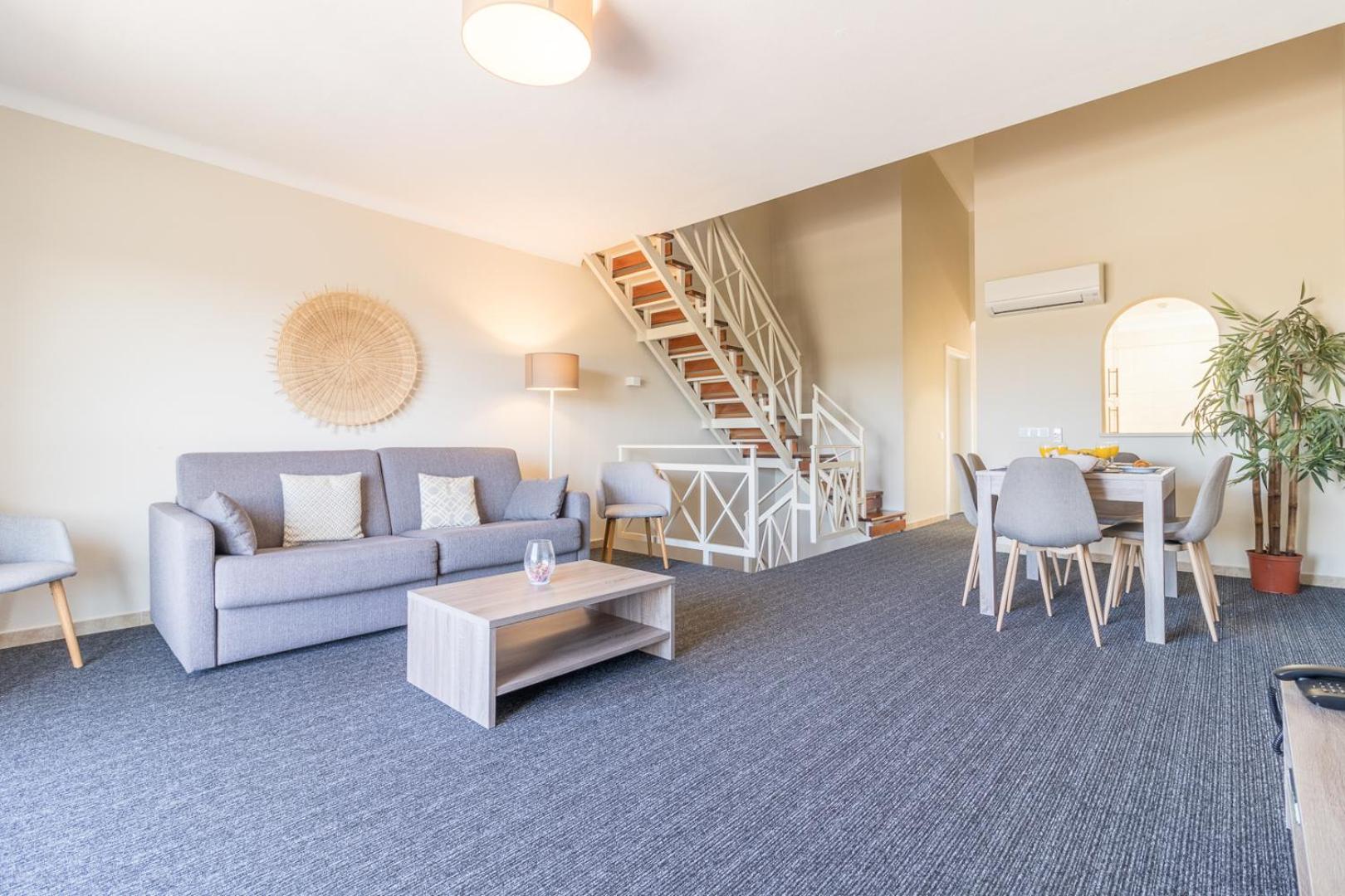 One-Bedroom Duplex Aparment with Balcony,1696634770:JPEG