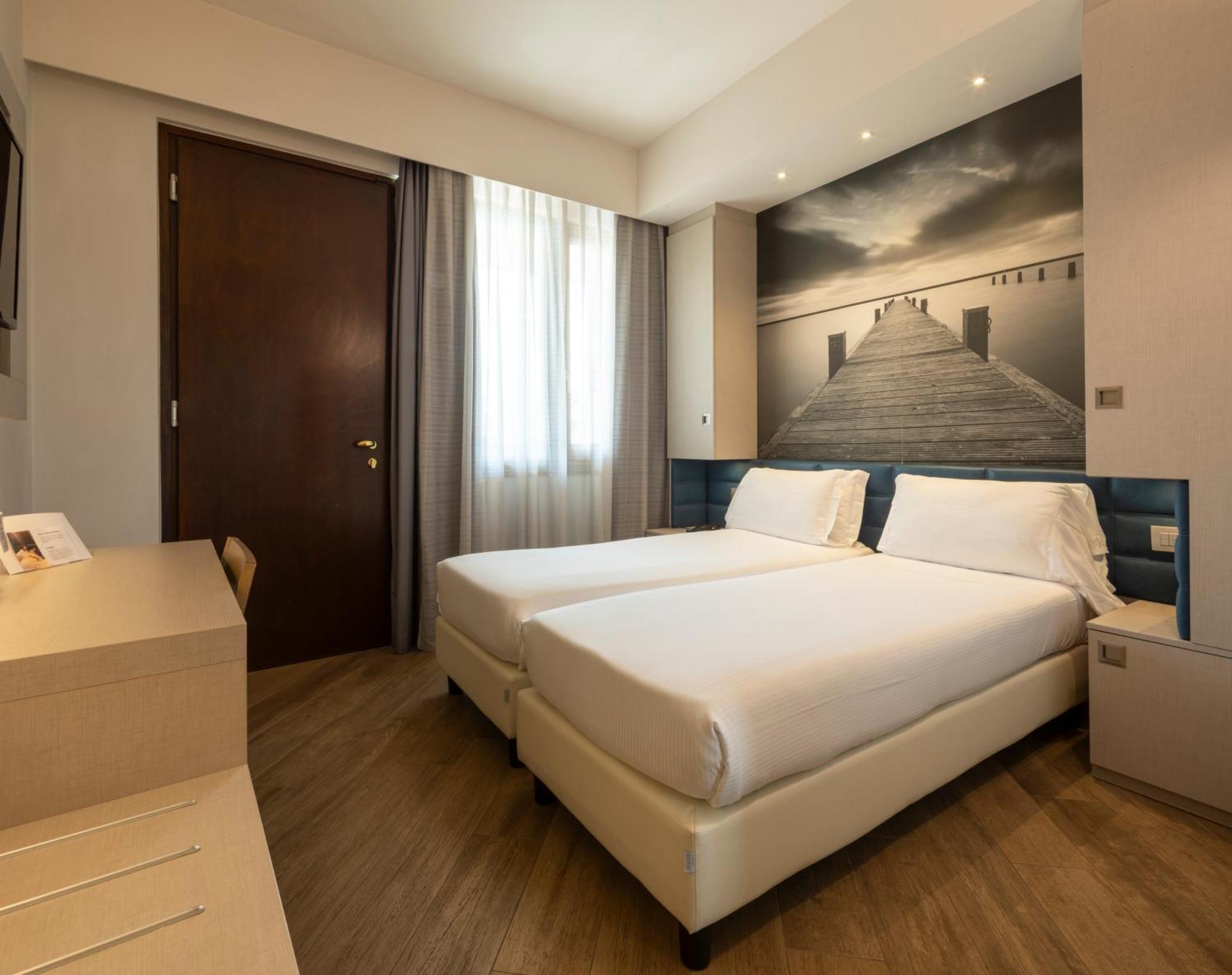 Standard Queen Room Convert Into Two Twin Beds