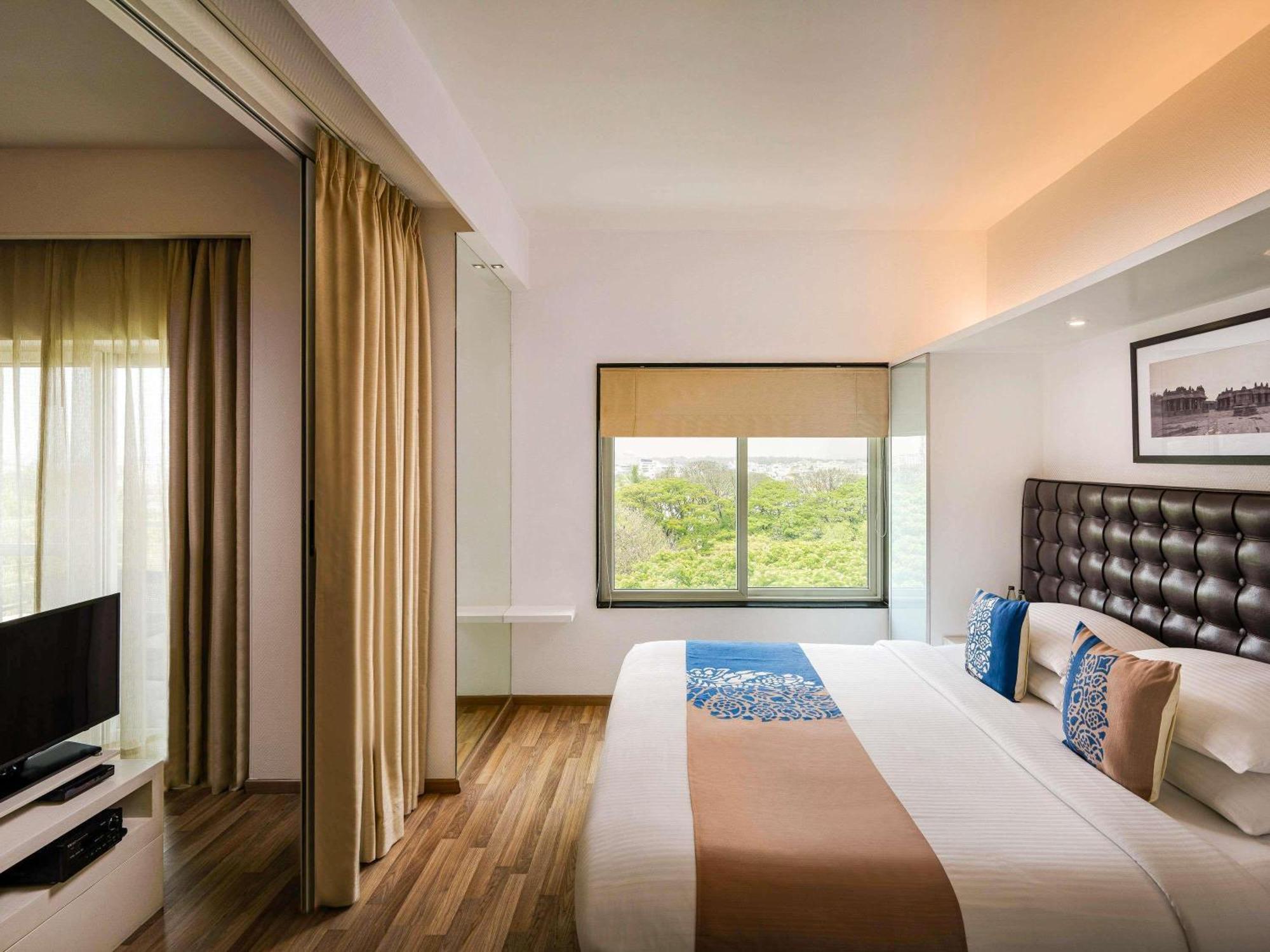 One-Bedroom Suite Balcony on food soft beverages spa Happy Hour 11 at By the Blue