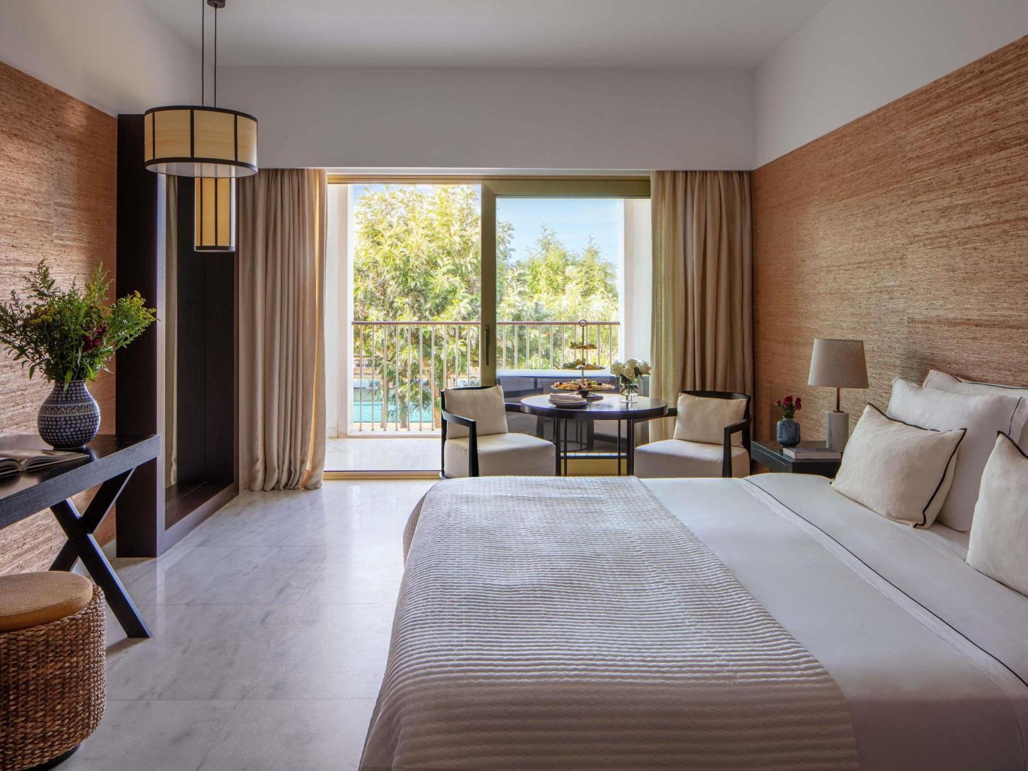 Deluxe King Room balcony pool view