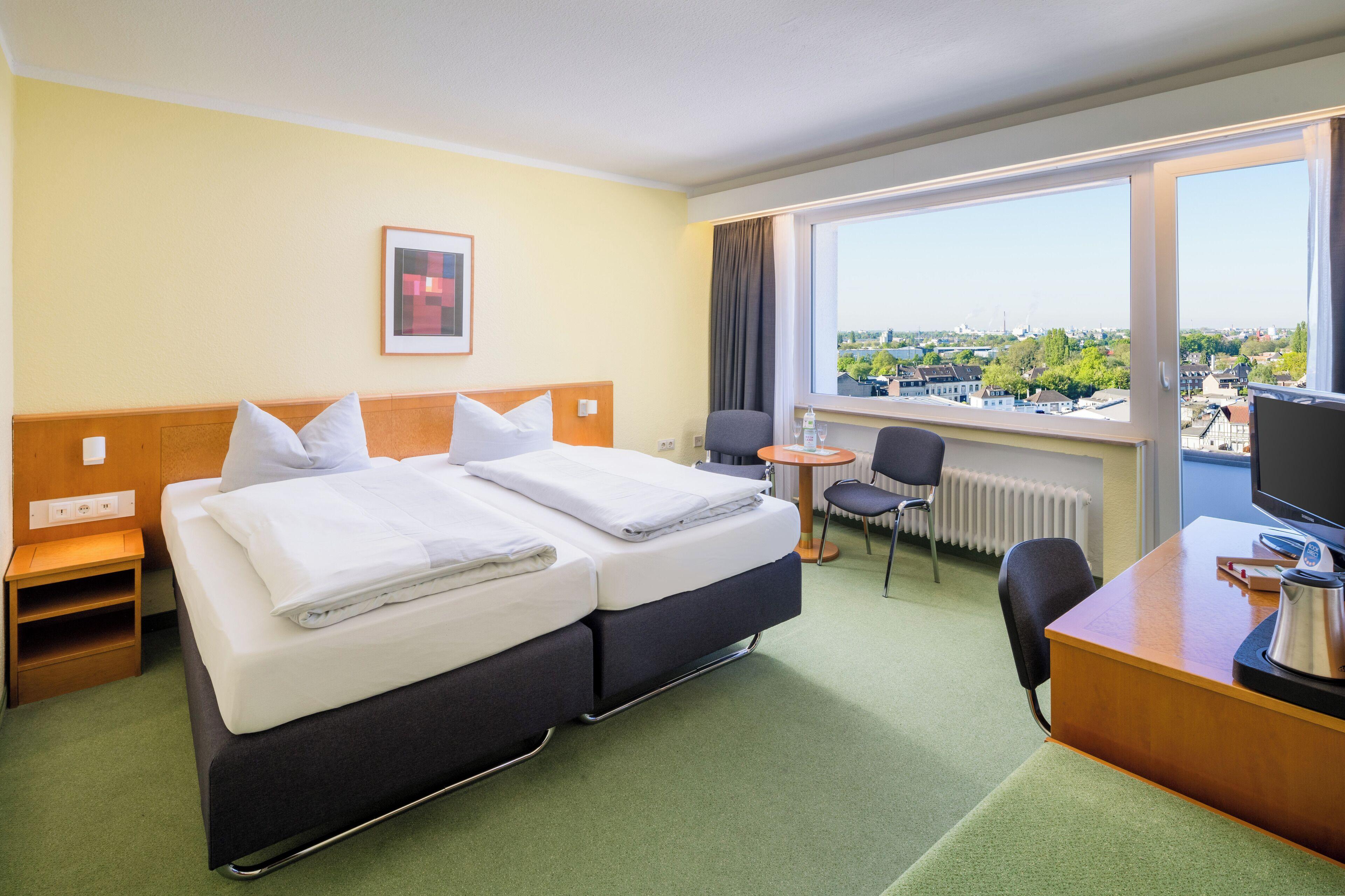 Quarto com Cama de Casal ou 2 de Solteiro