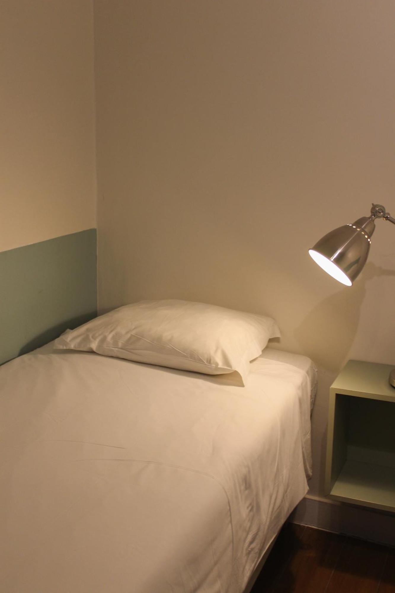Quarto Standard com 2 Camas de Solteiro e Banheiro Compartilhado