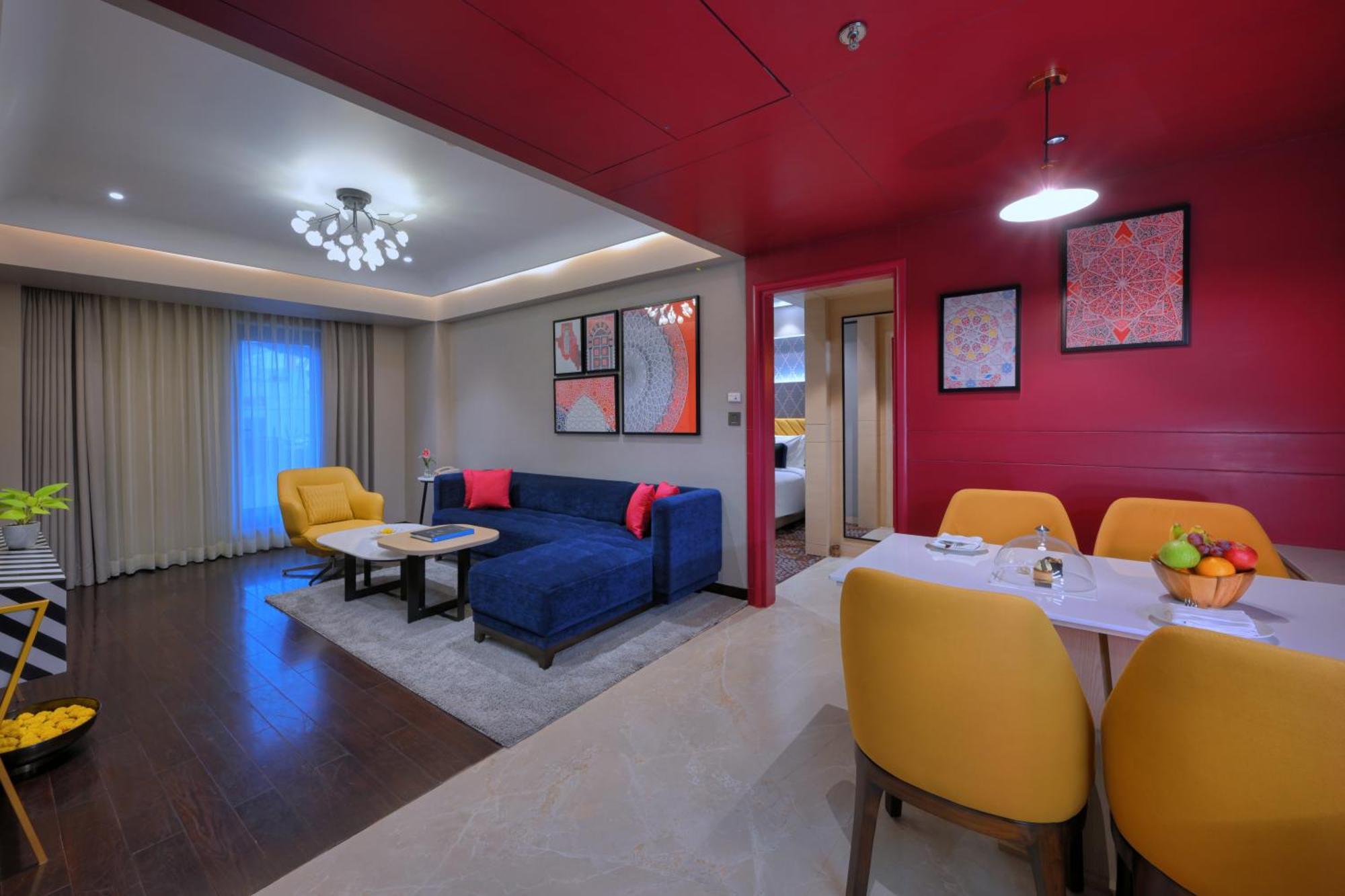 Executive Suite Room seating area terrace on food beverage spa laundry | 11 IMFL Happy Hours from 6 to 8 pm