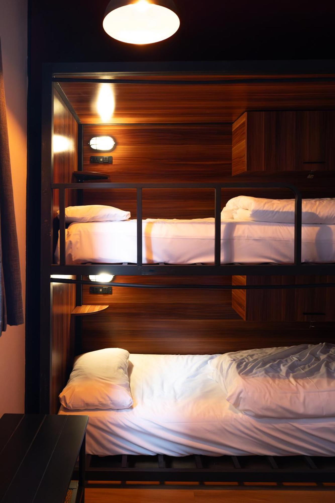 Cama em Dormitório com 4 Camas
