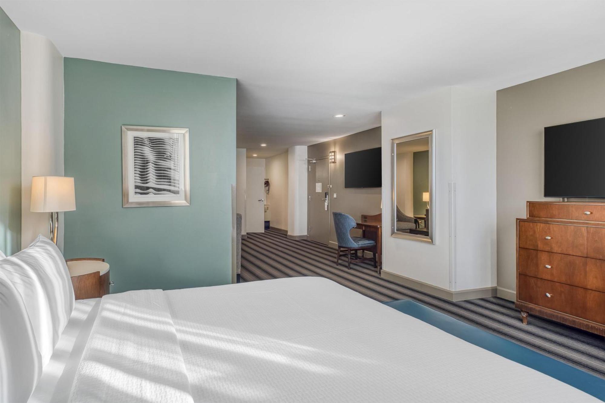 Suite Deluxe con cama extragrande y ducha a ras de suelo - Adaptada para personas de movilidad reducida