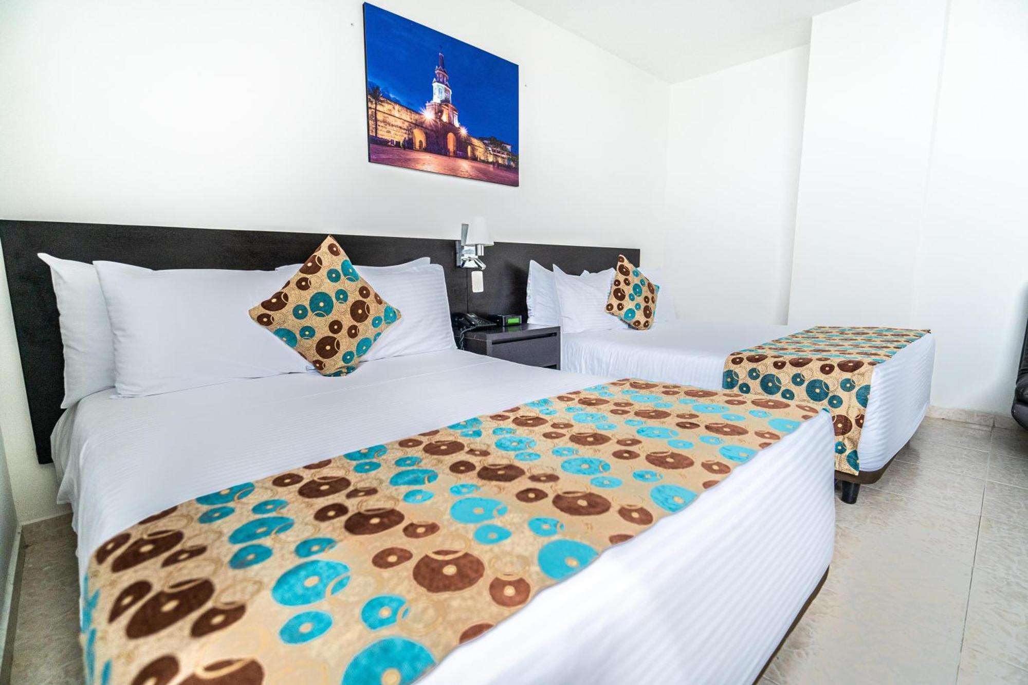 Quarto Superior com 2 Camas de Solteiro e Vista do Mar