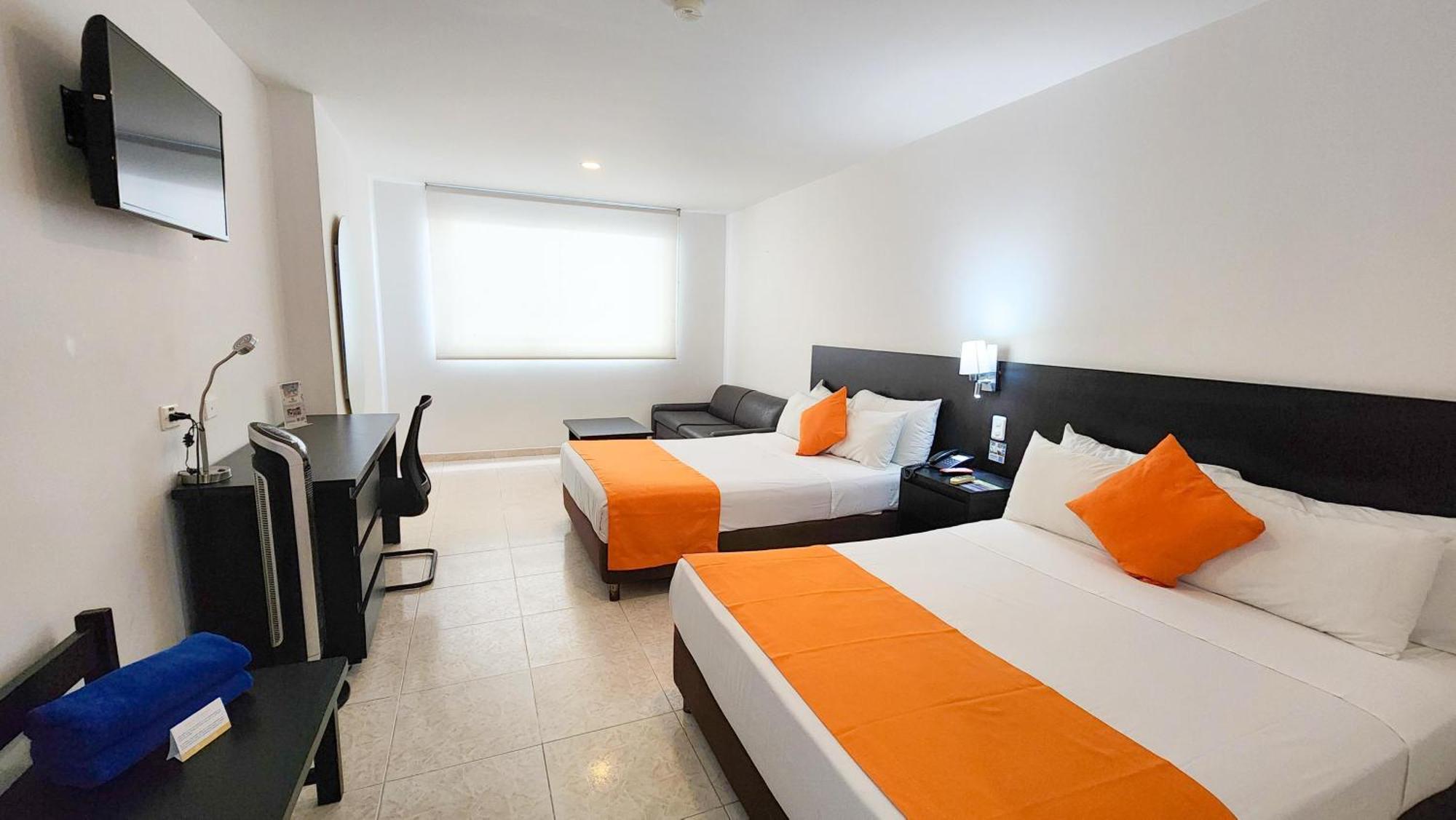 Quarto Duplo com 2 Camas de Casal